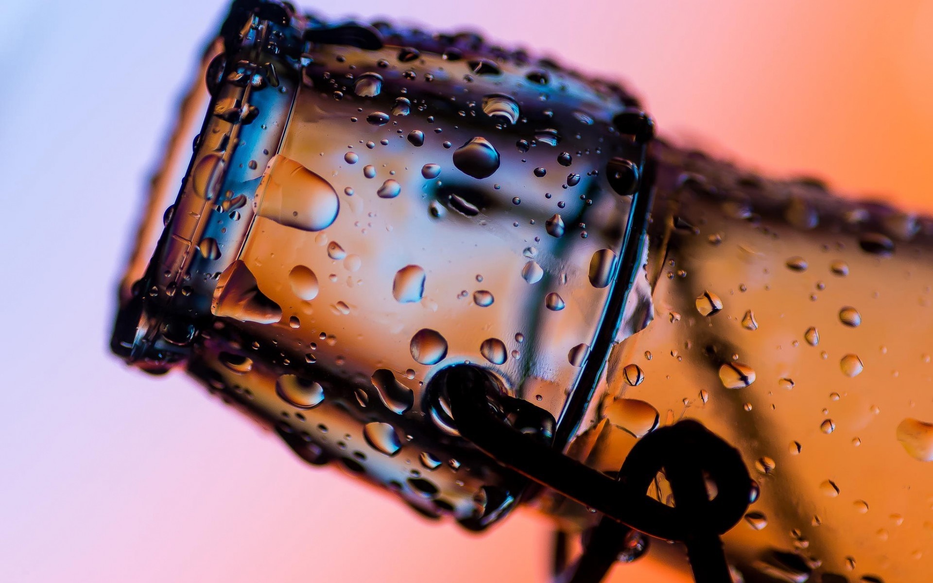 Close-up of a glass bottle with water drops HD Wallpaper