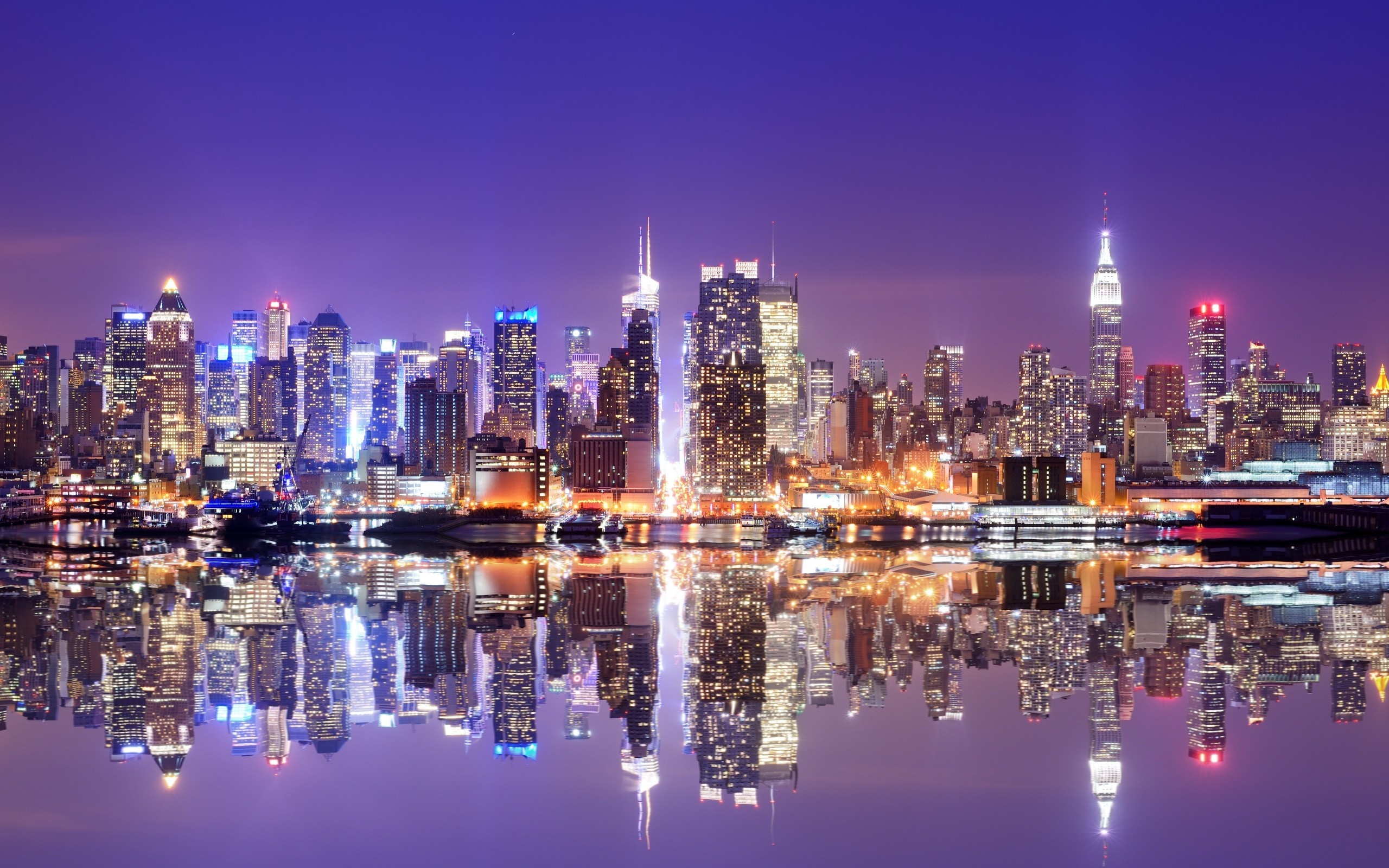 New York City skyline at night with reflections HD Wallpaper