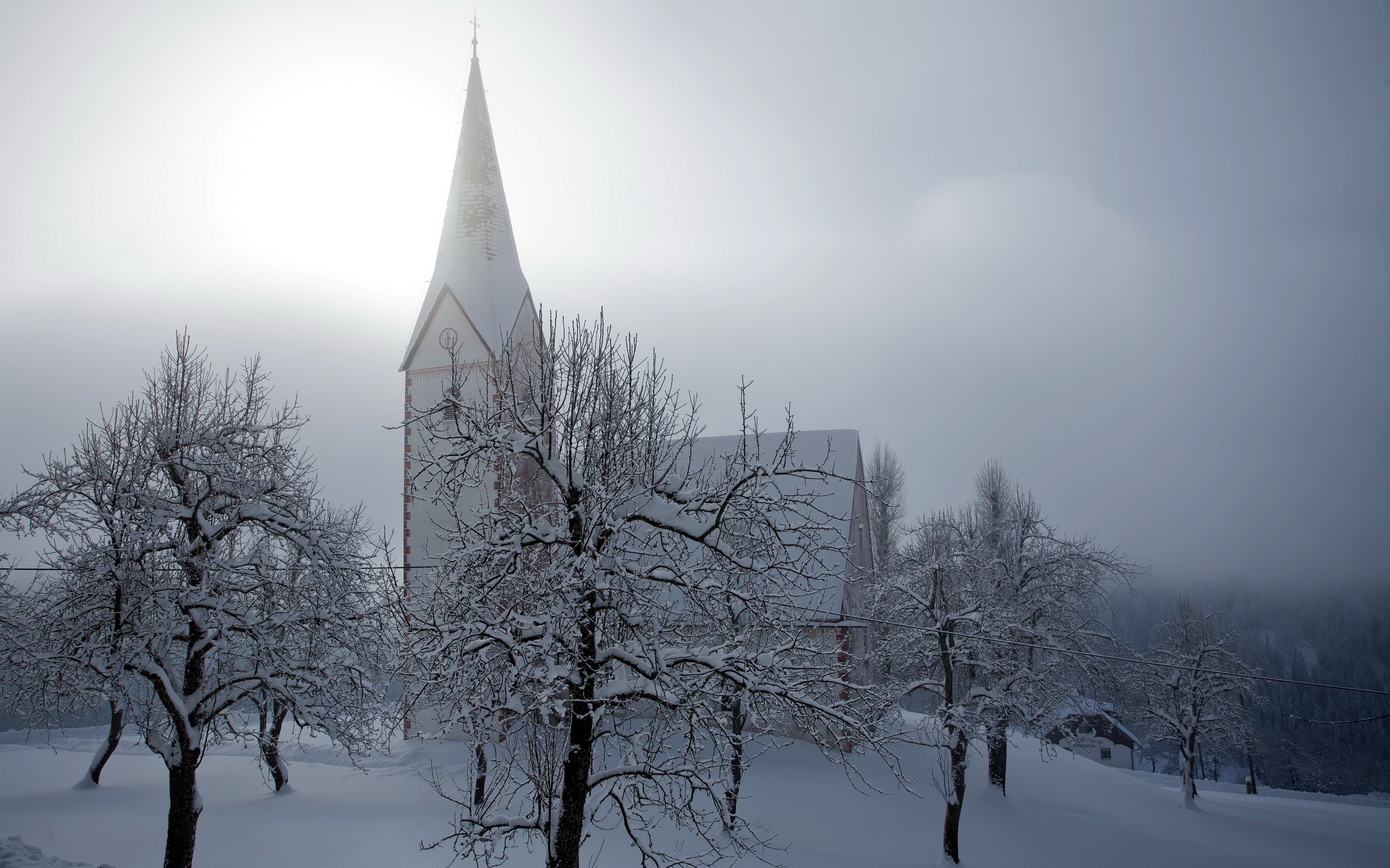Snowy winter morning with a church and trees HD Wallpaper