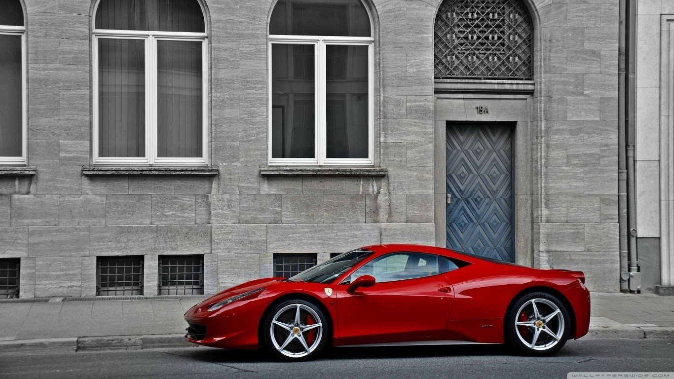 Red Ferrari 458 parked in front of a building HD Wallpaper