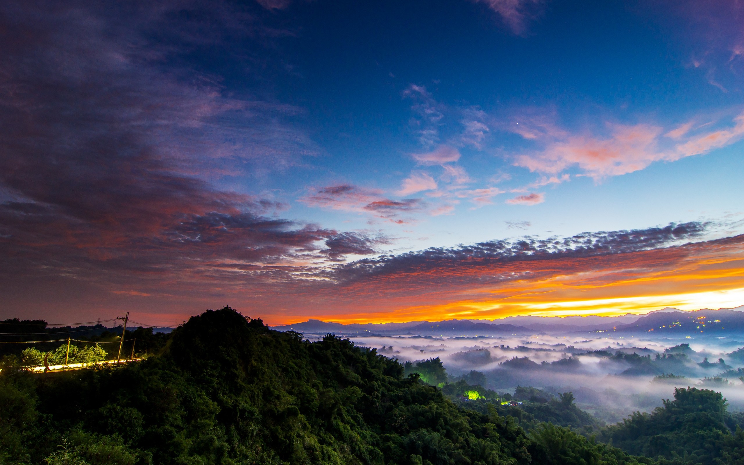 Mountain landscape with fog and colorful sunset sky HD Wallpaper