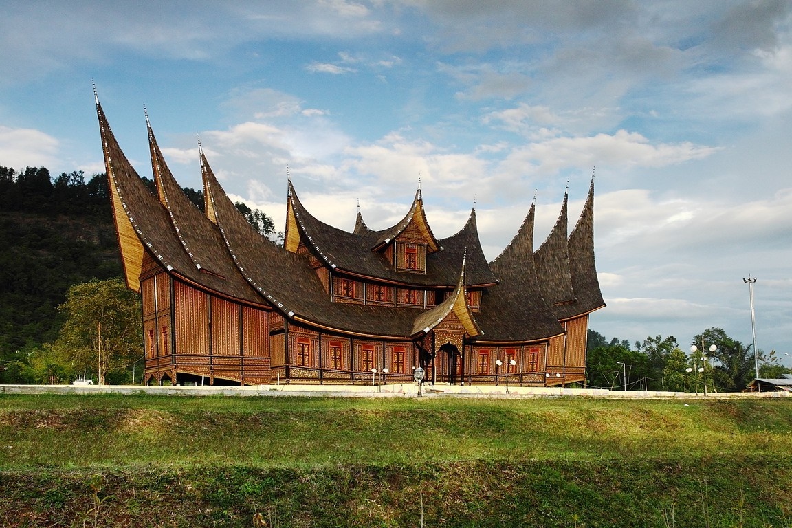 Traditional Minangkabau architecture building with pointed roofs HD Wallpaper