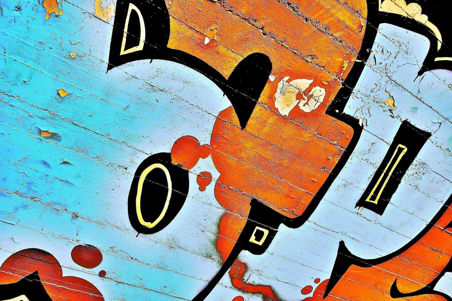 Graffiti art with orange and blue colors HD Wallpaper
