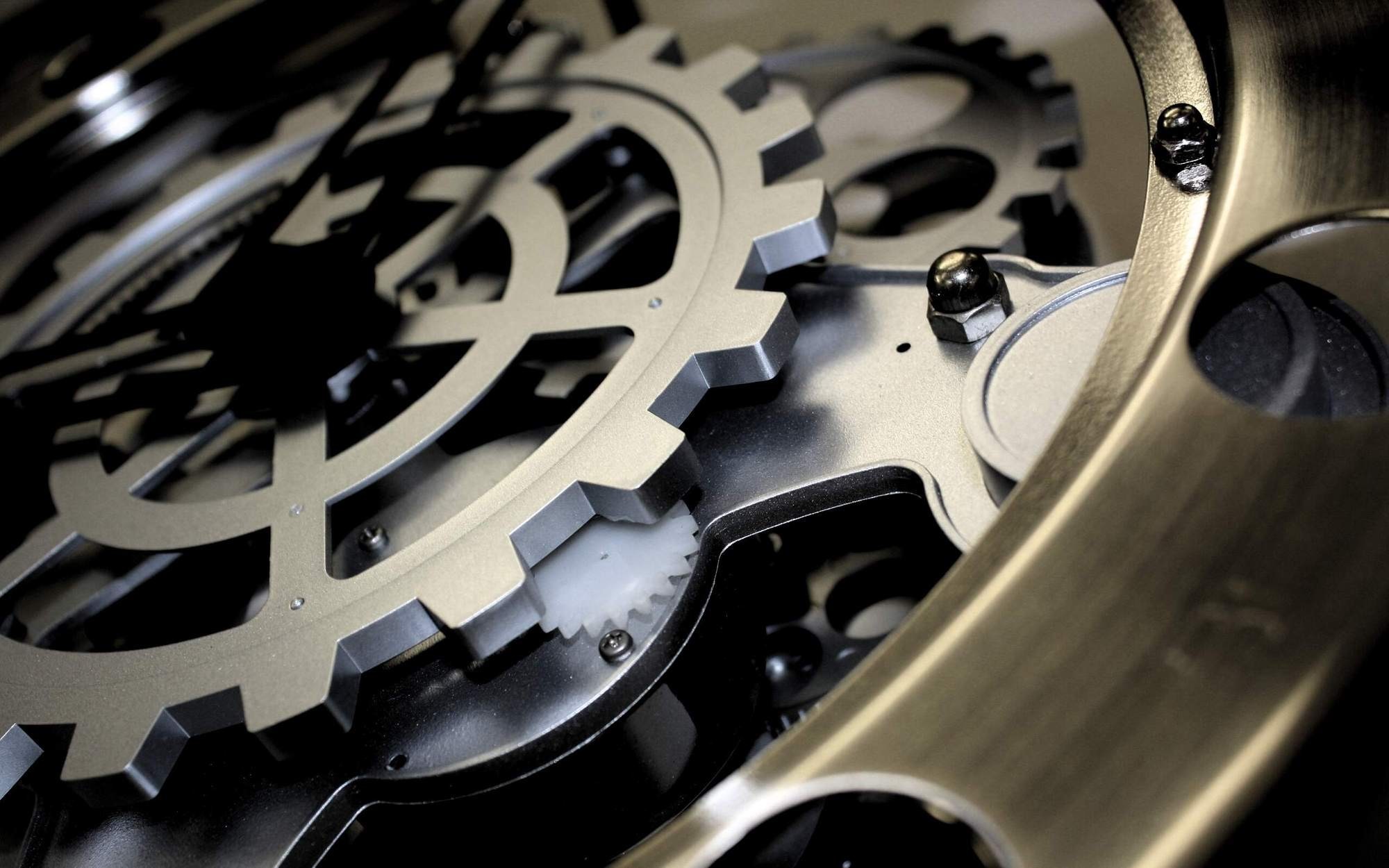 Close-up of Intricate Clockwork Gears HD Wallpaper