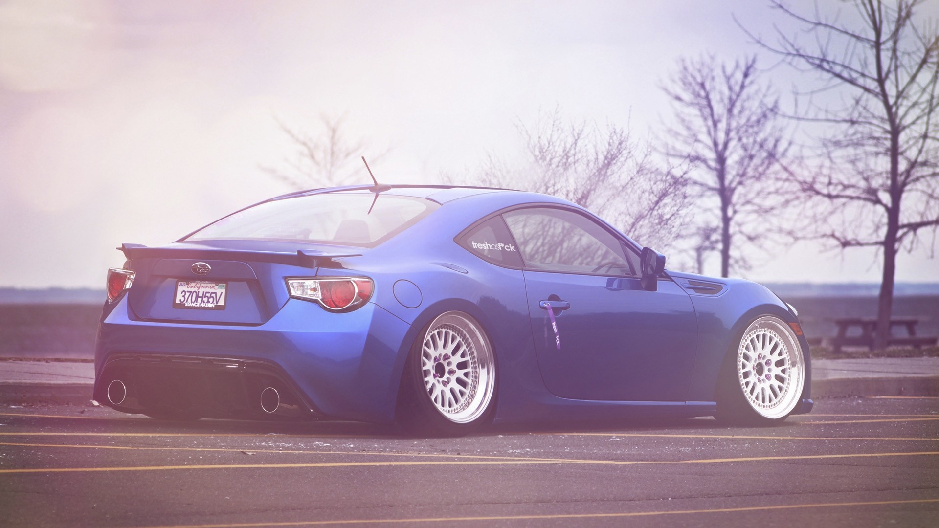 Blue Subaru BRZ sports car with custom wheels HD Wallpaper