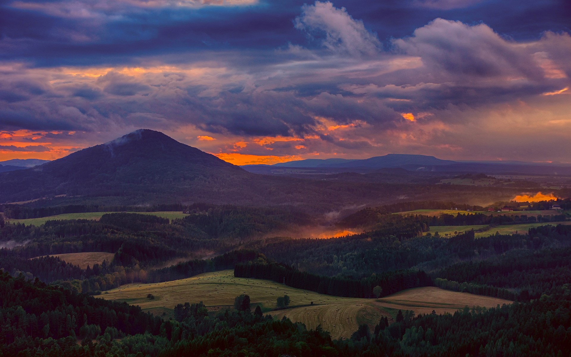 Mountain landscape at sunset with dramatic clouds HD Wallpaper