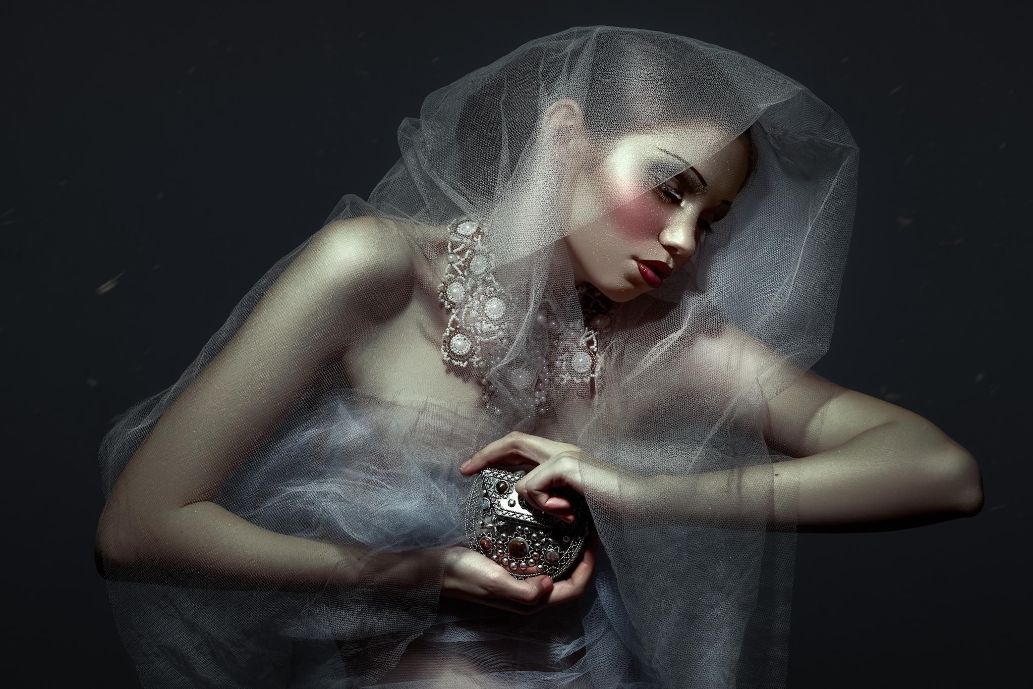 Woman in veil holding ornate box HD Wallpaper