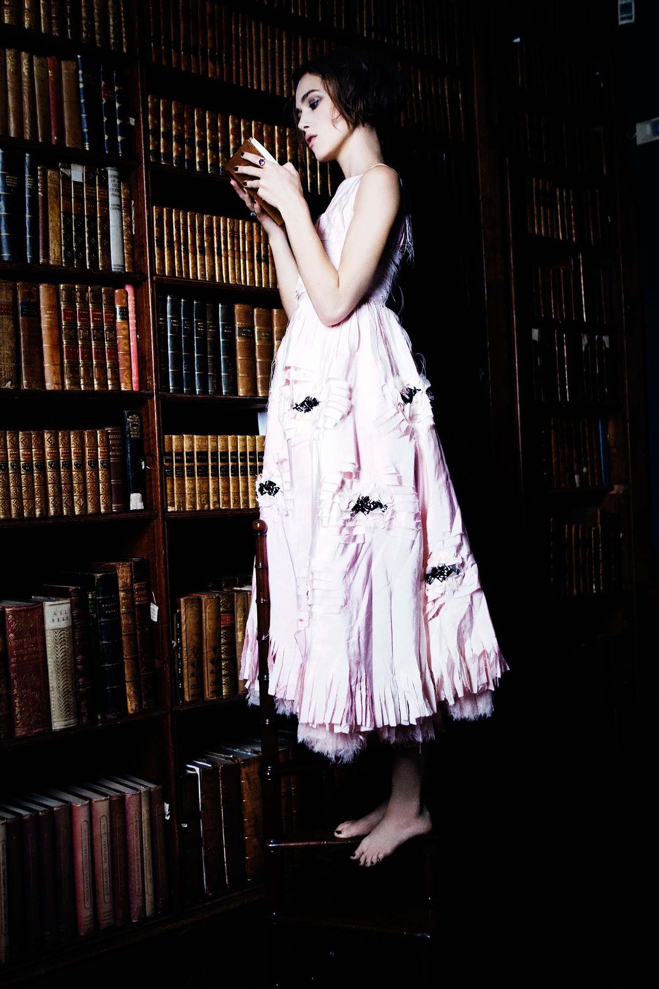 Keira Knightley in a pink dress in a library HD Wallpaper