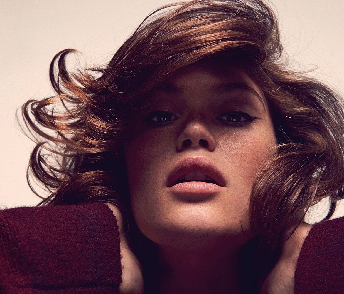 Close up portrait of a woman with brown hair and freckles HD Wallpaper