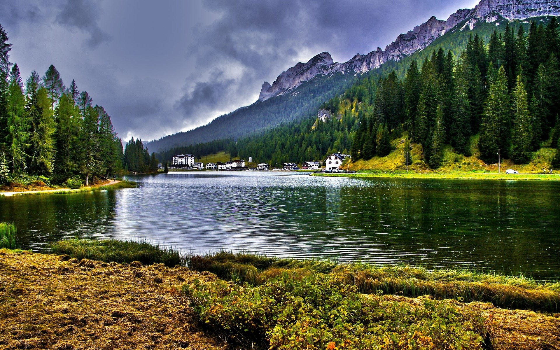 Lake with mountains and forest in the background HD Wallpaper