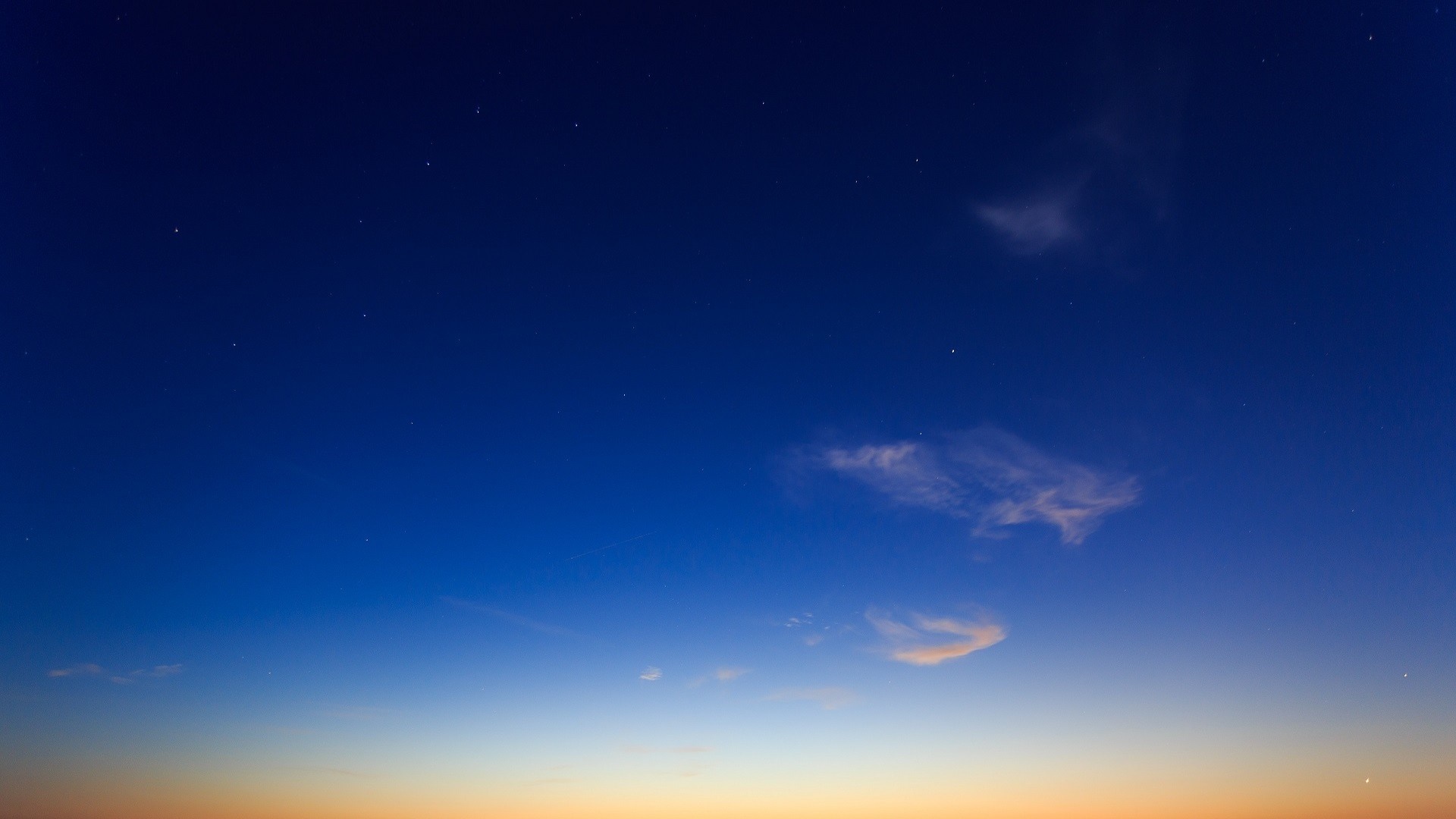 Night sky with stars and clouds at dusk HD Wallpaper