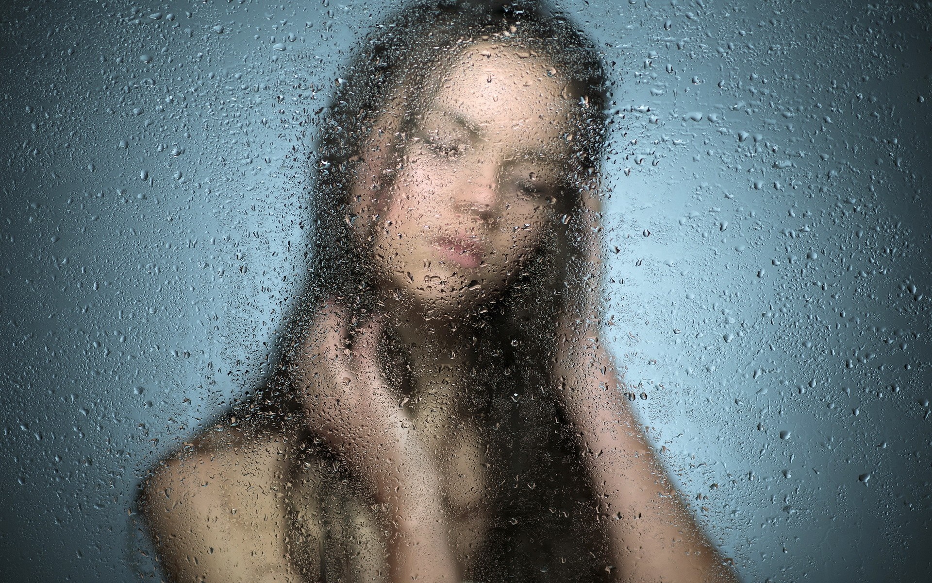 Woman behind a wet window HD Wallpaper