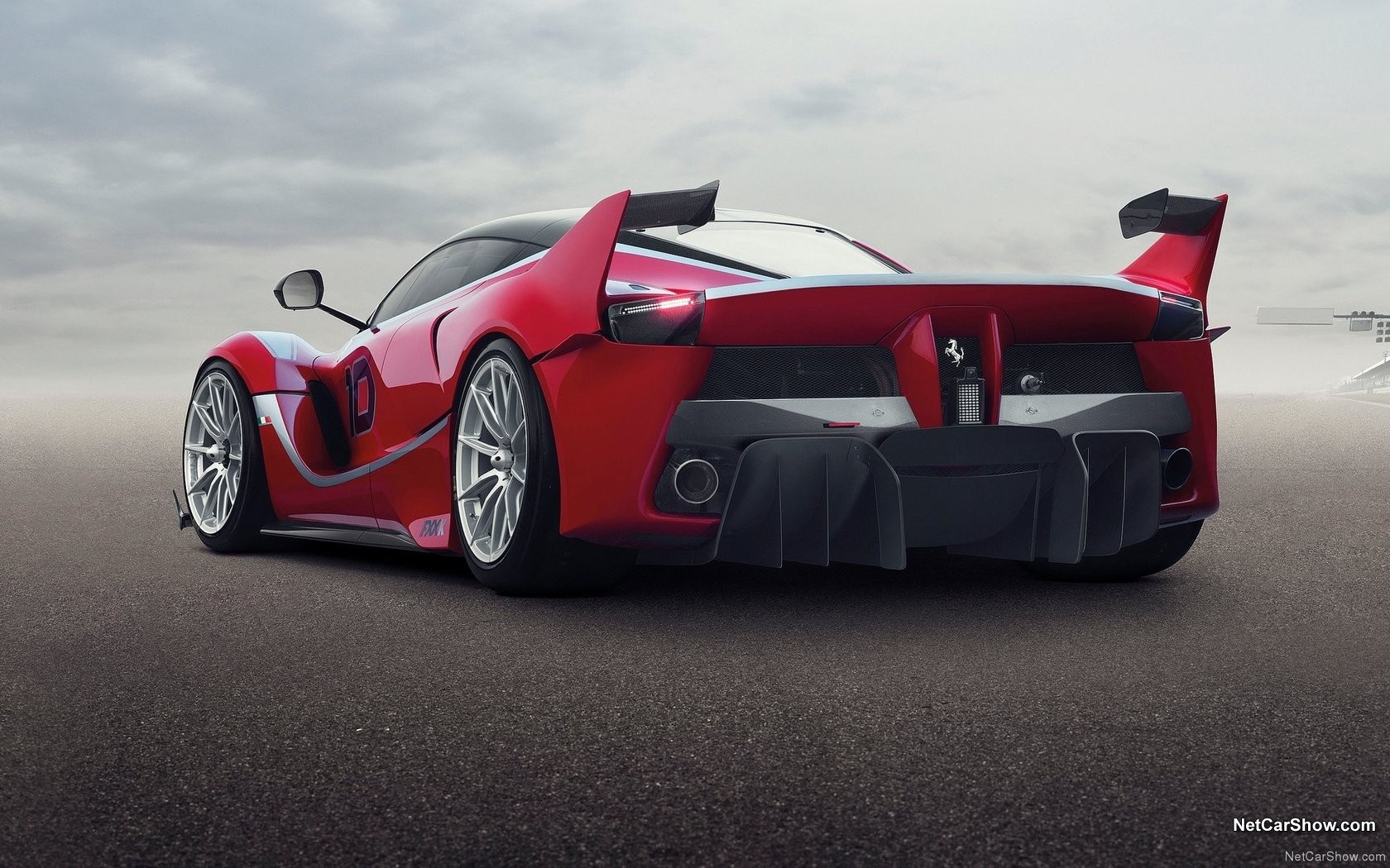 Red Ferrari FXX K Evo on asphalt HD Wallpaper