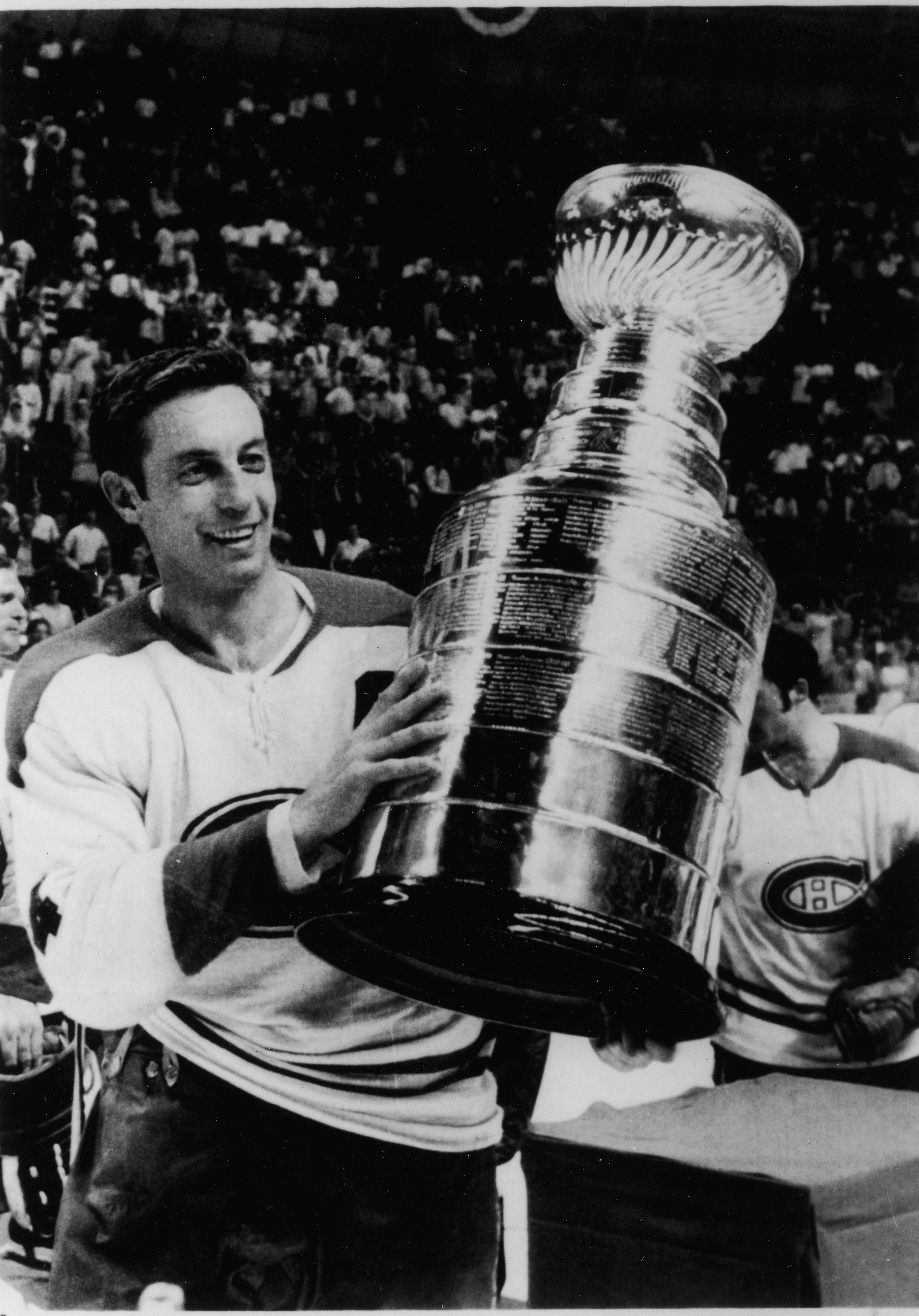 Jean Beliveau of Montreal Canadiens holding the Stanley Cup HD Wallpaper