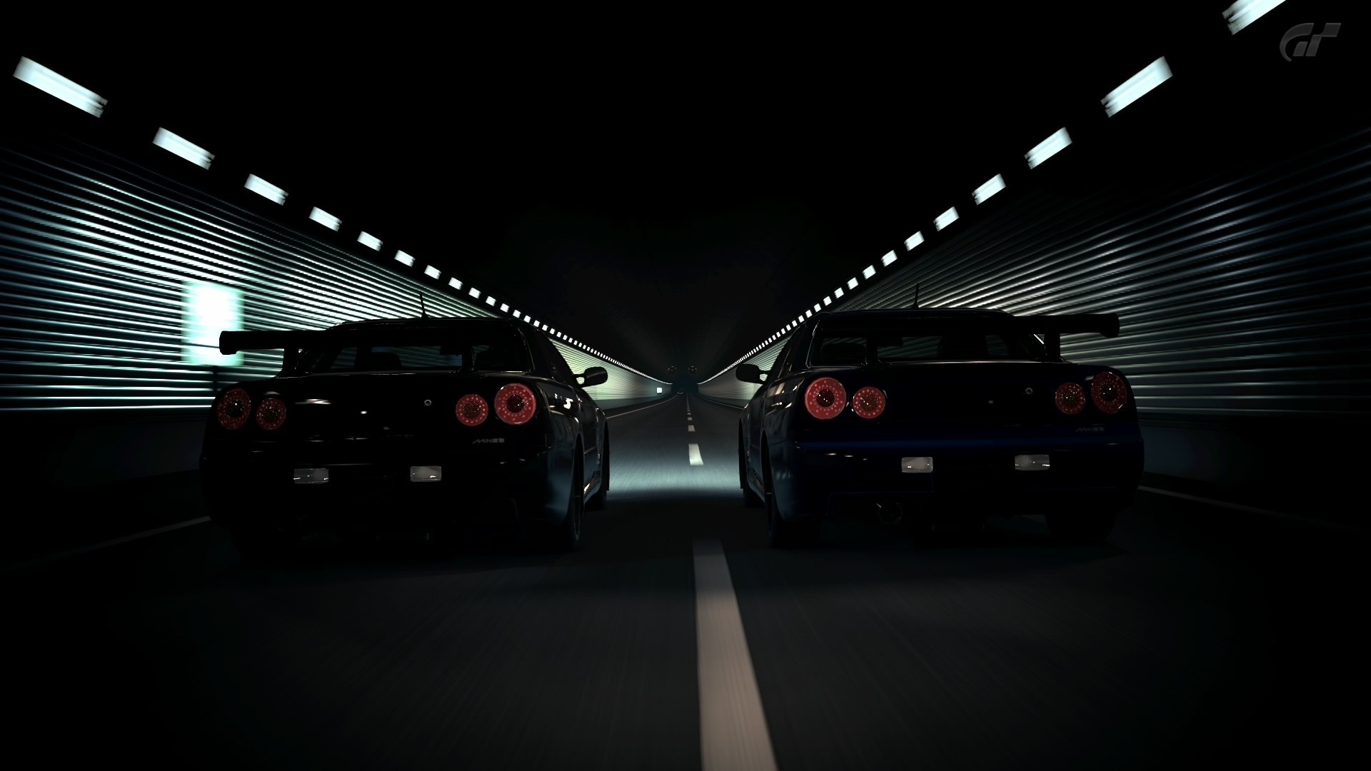 Two Nissan Skyline GT-R R34s racing in a tunnel HD Wallpaper