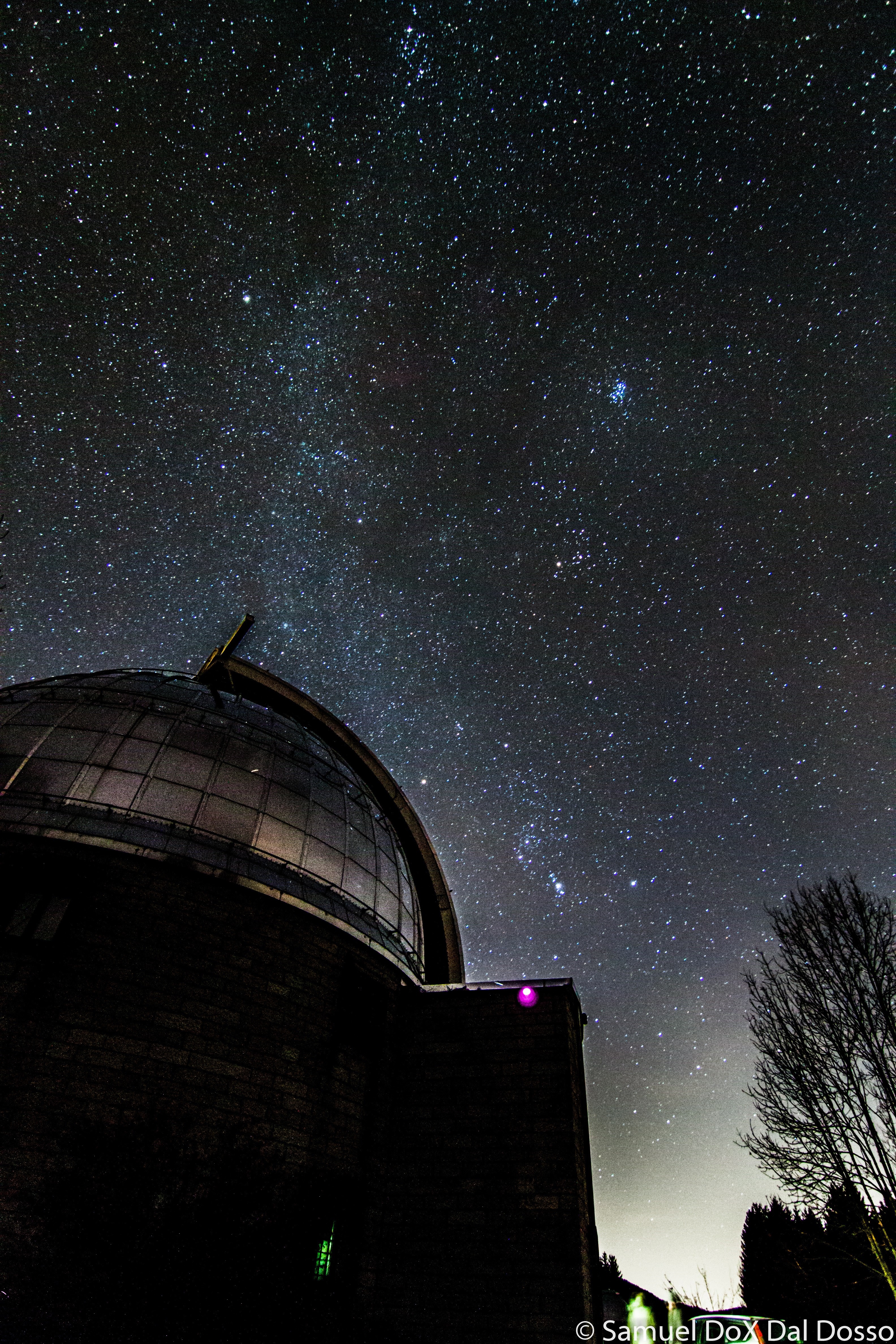 Observatory dome under a starry night sky HD Wallpaper