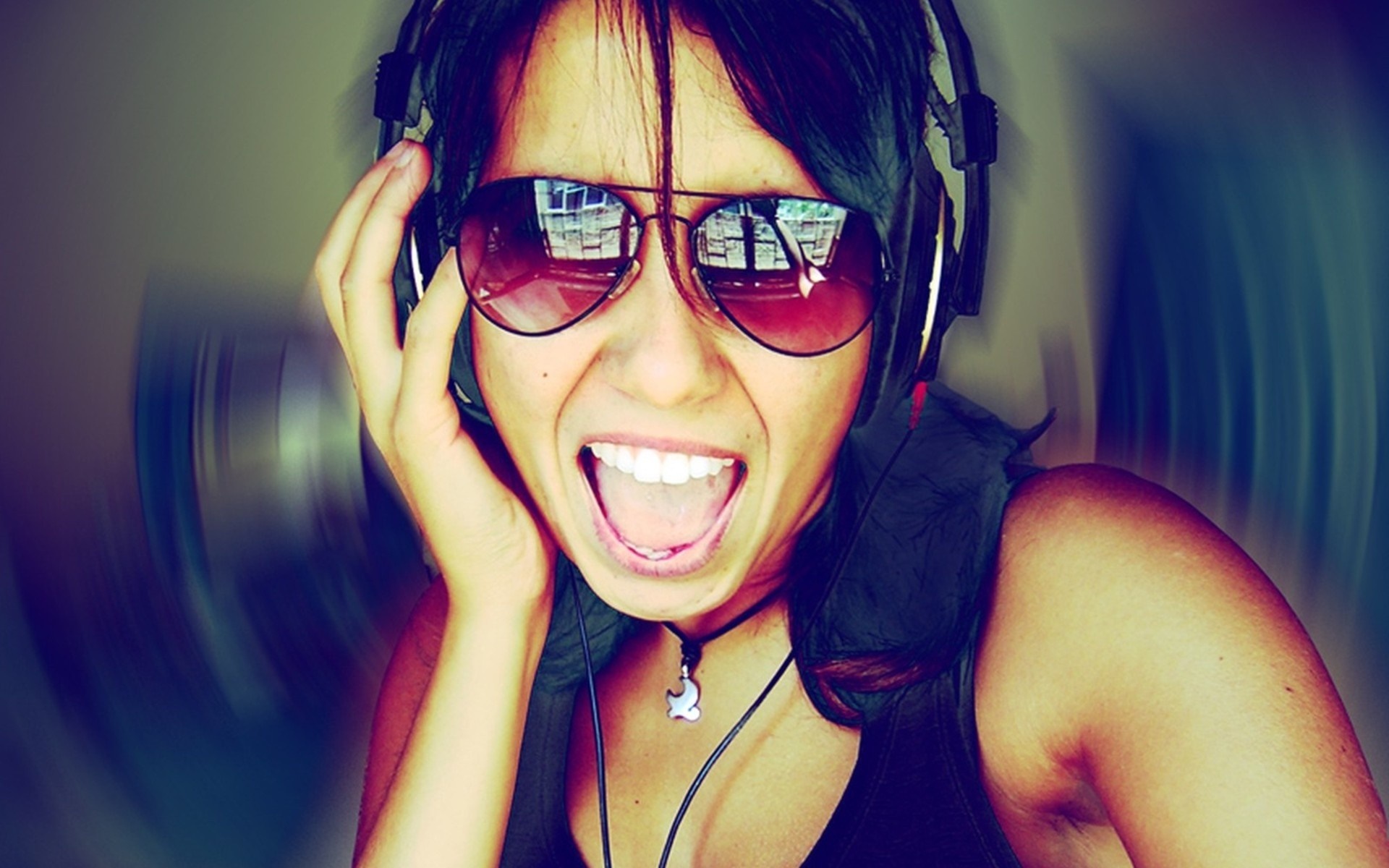 Woman wearing headphones and sunglasses singing HD Wallpaper