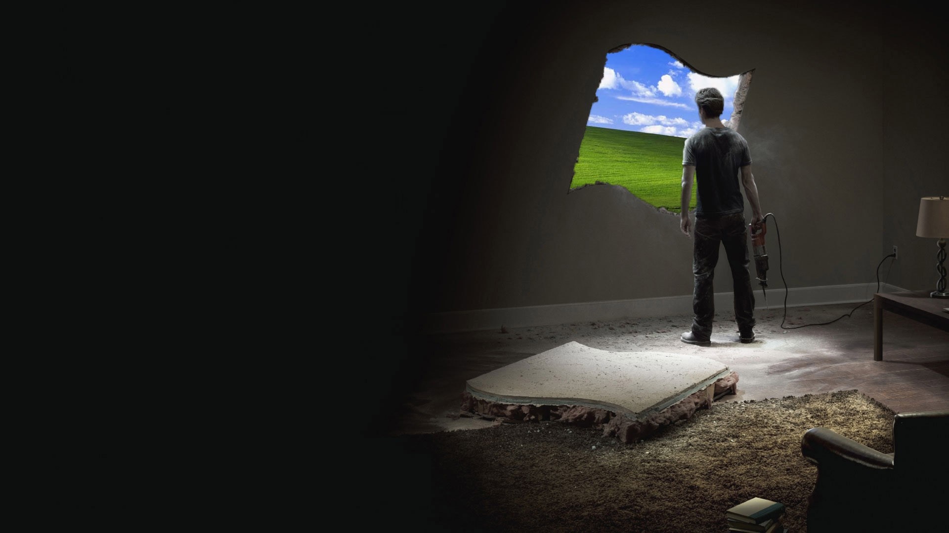 Man breaks hole in wall to reveal Windows XP landscape HD Wallpaper