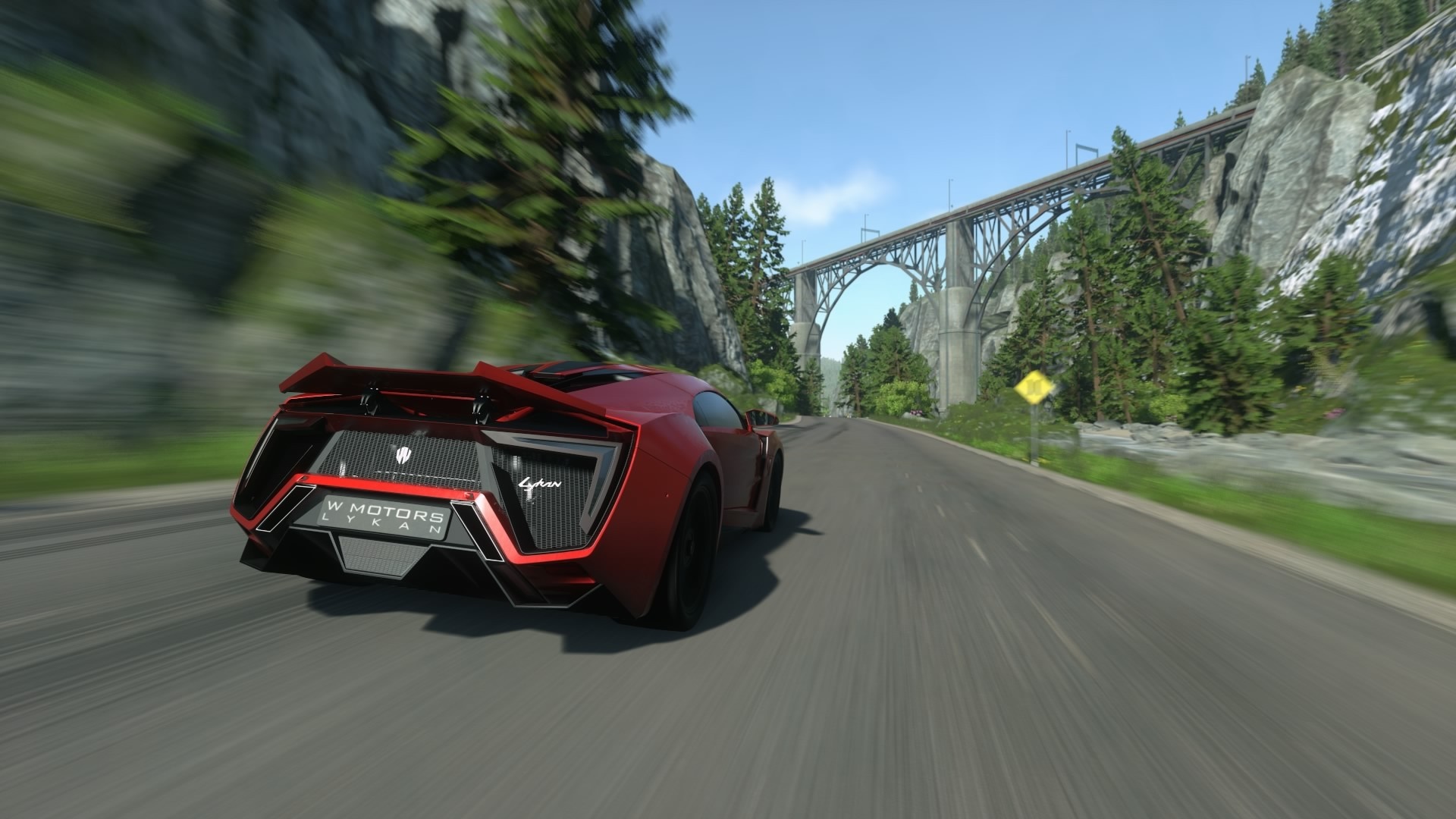 Red Lykan HyperSport driving on a road with a bridge HD Wallpaper
