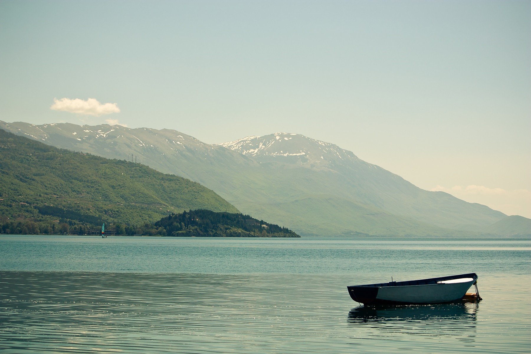 Boat on Lake Ohrid with Mountains in Macedonia HD Wallpaper