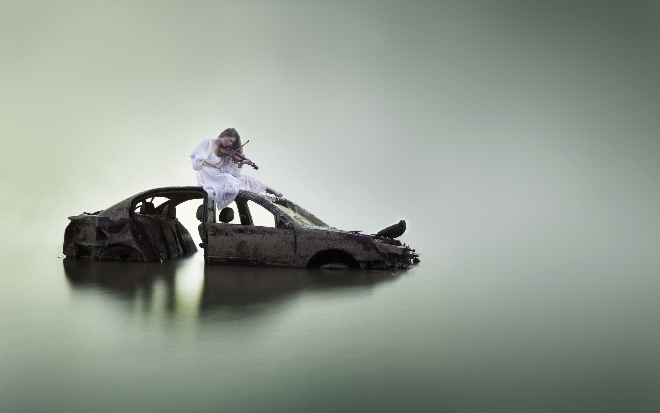 Woman in white dress playing violin on submerged car HD Wallpaper