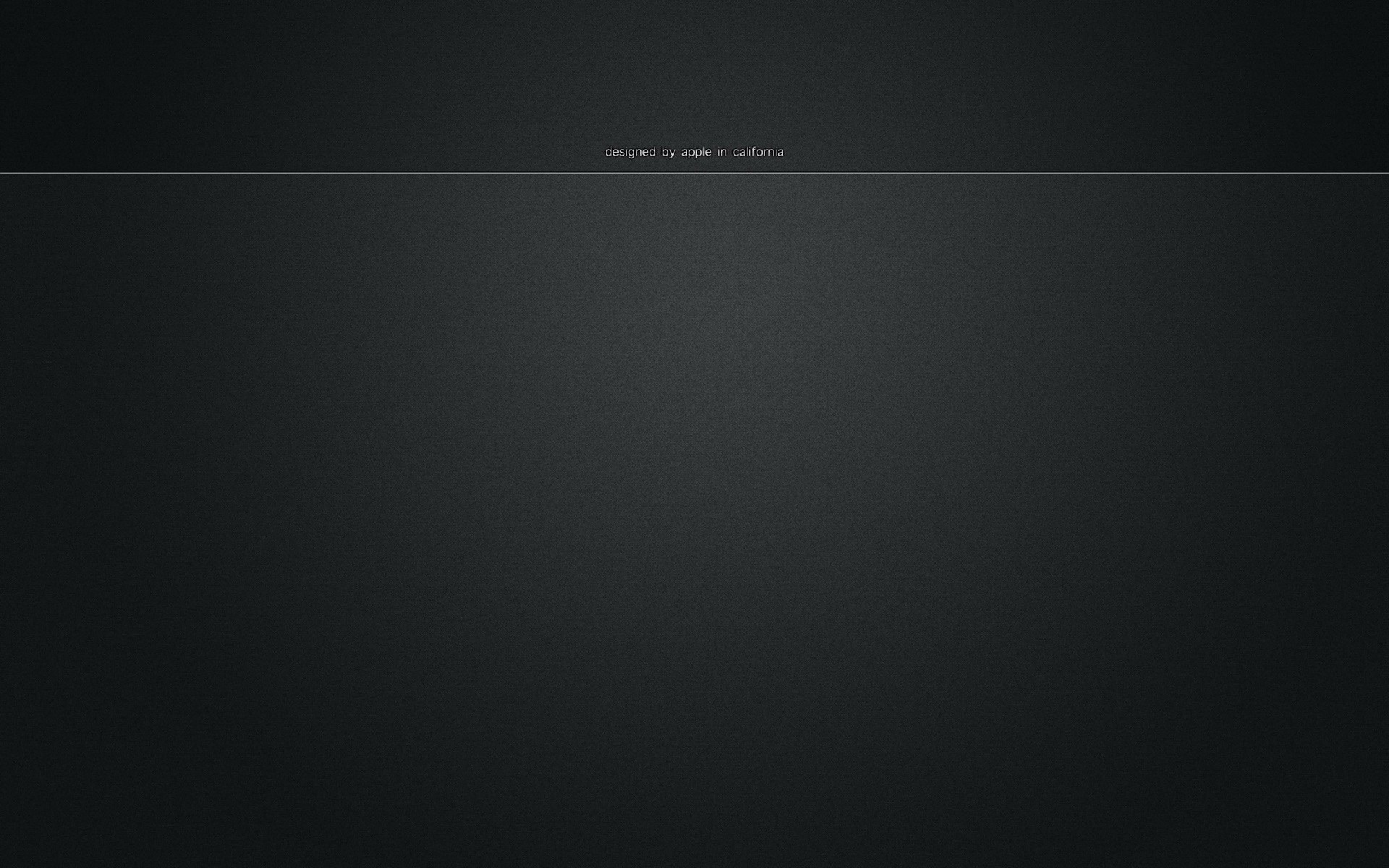 Designed by Apple in California text on dark background HD Wallpaper