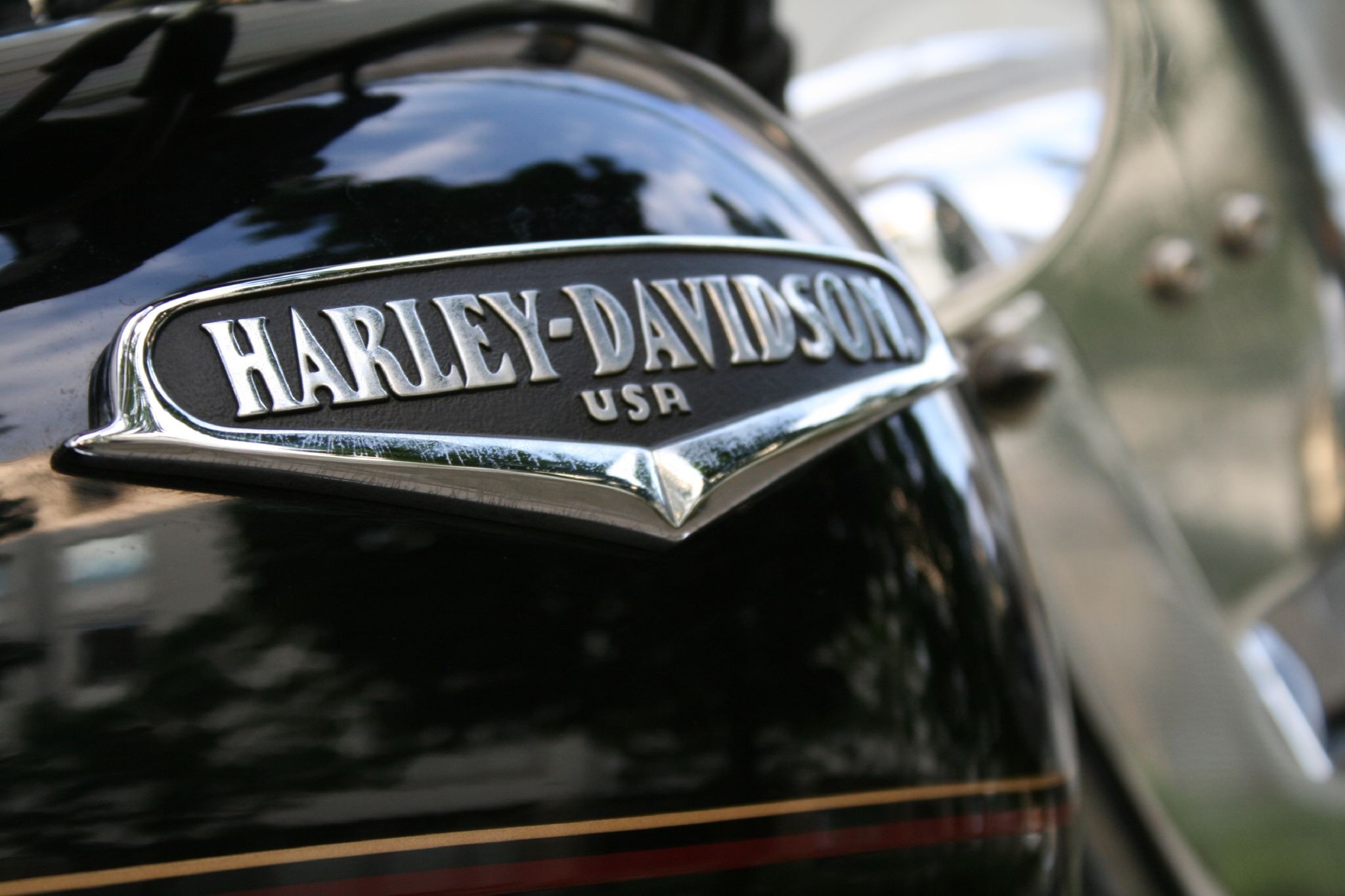 Close-up of Harley-Davidson Motorcycle Tank Emblem HD Wallpaper