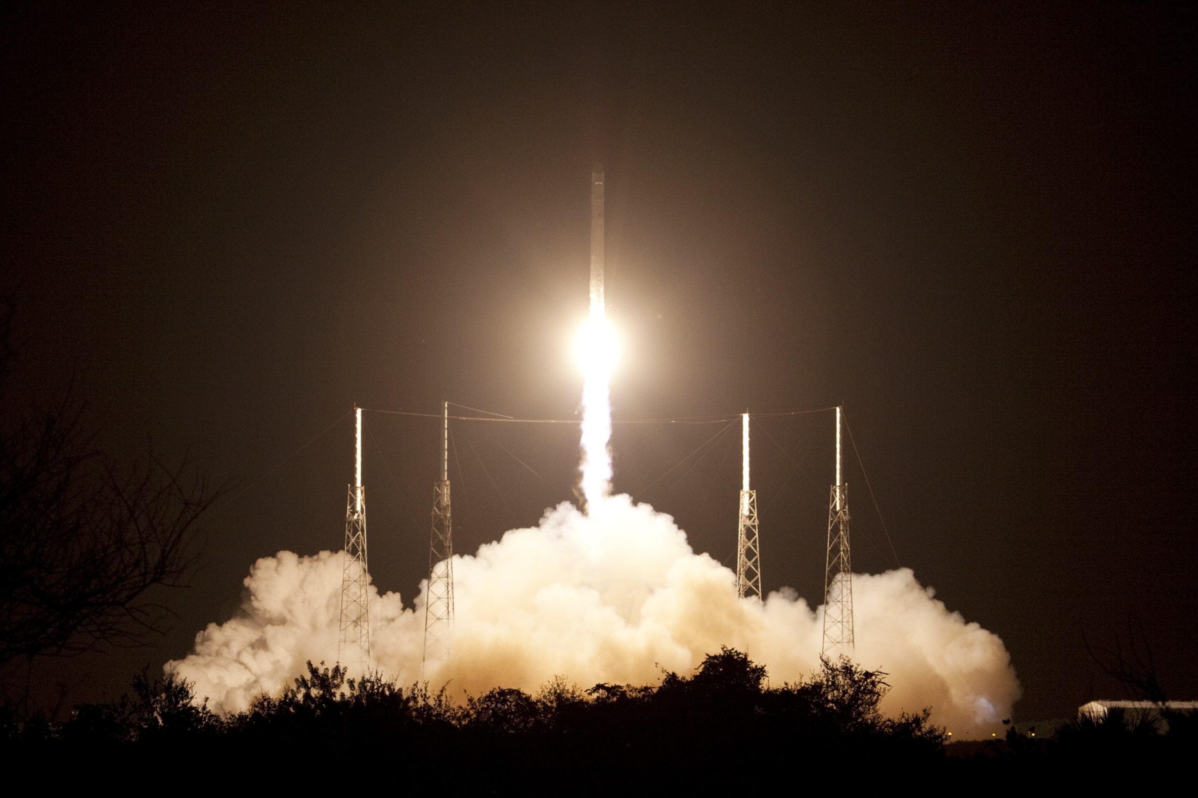 Rocket Launch at Night with Smoke and Launch Pads HD Wallpaper
