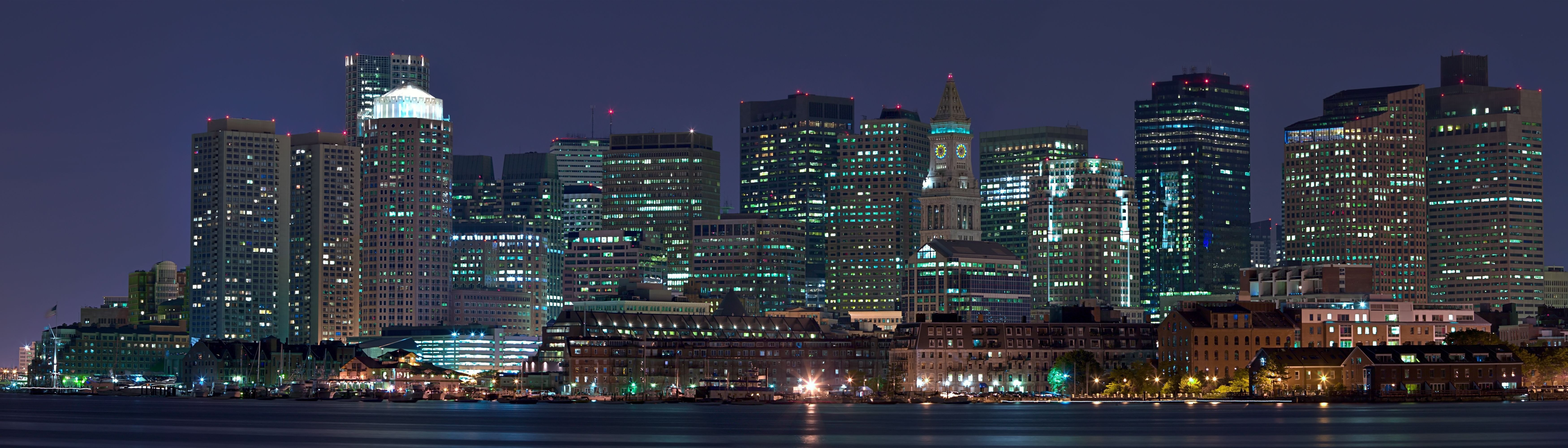 Boston cityscape at night with illuminated skyscrapers HD Wallpaper