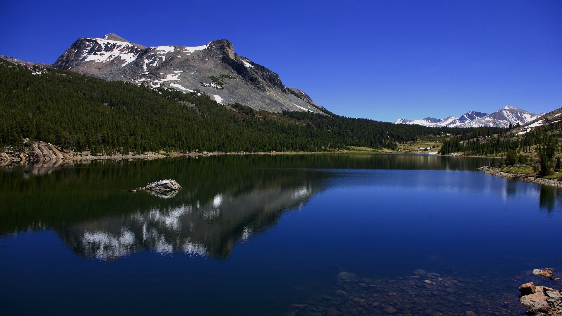 Mountain lake with reflection and snow-capped peaks HD Wallpaper