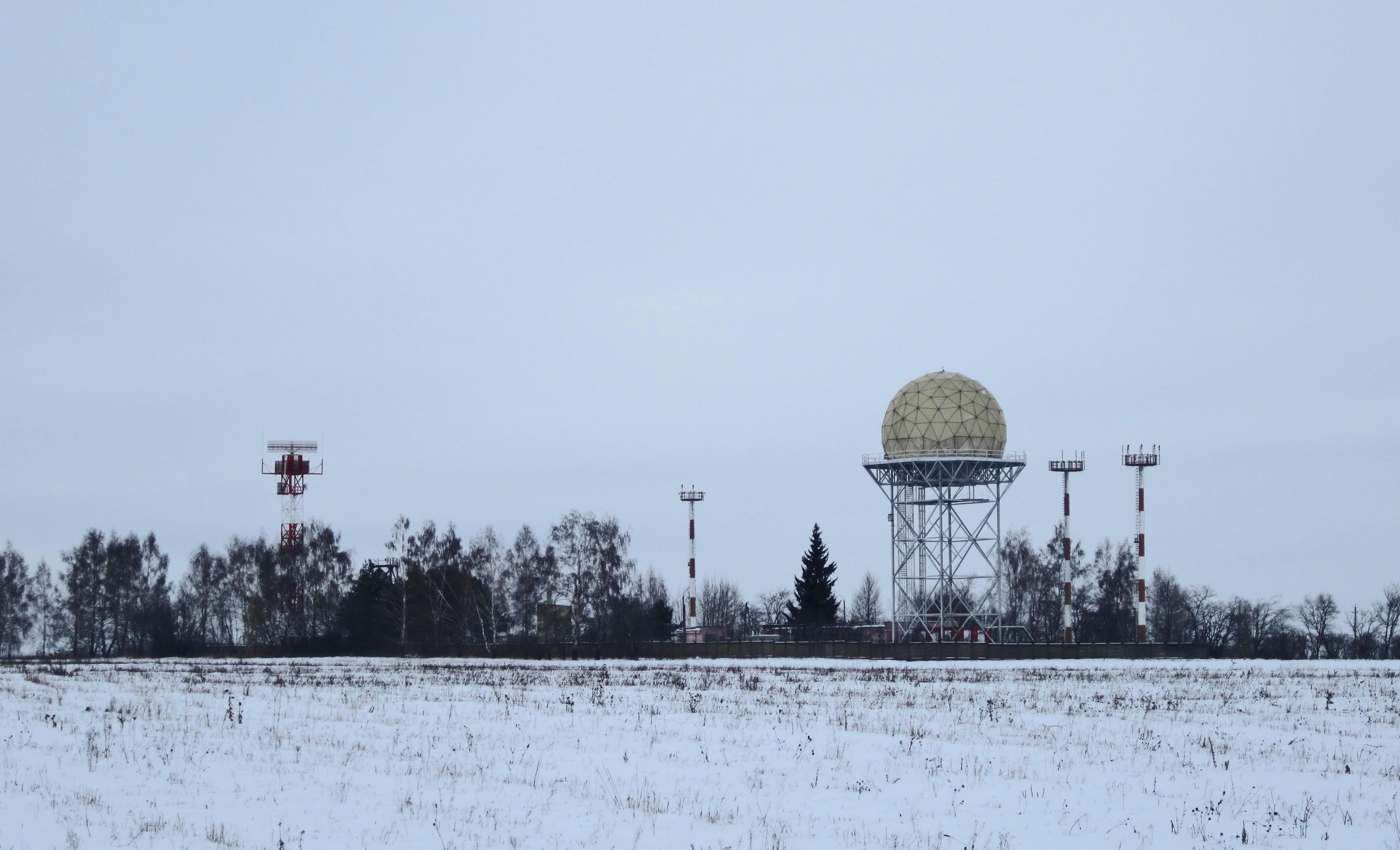 Winter landscape with radar domes and towers HD Wallpaper