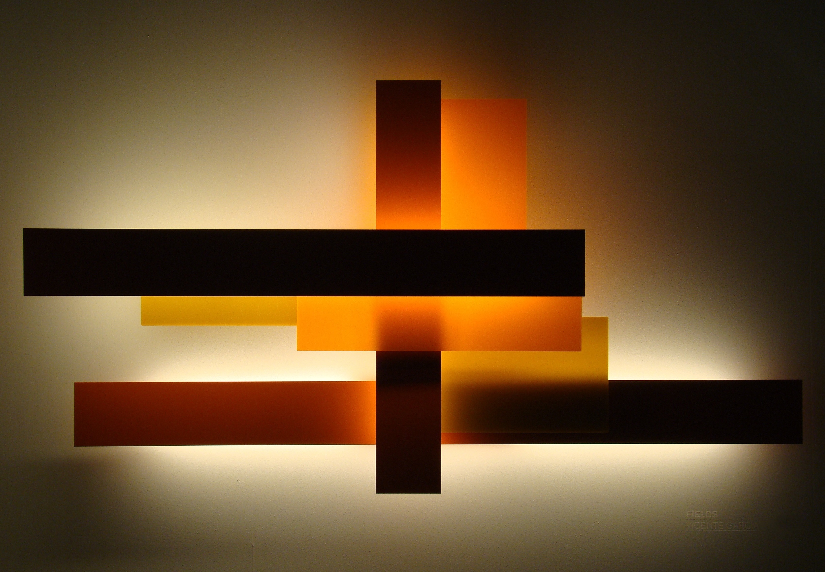 Abstract geometric light installation with warm colors HD Wallpaper