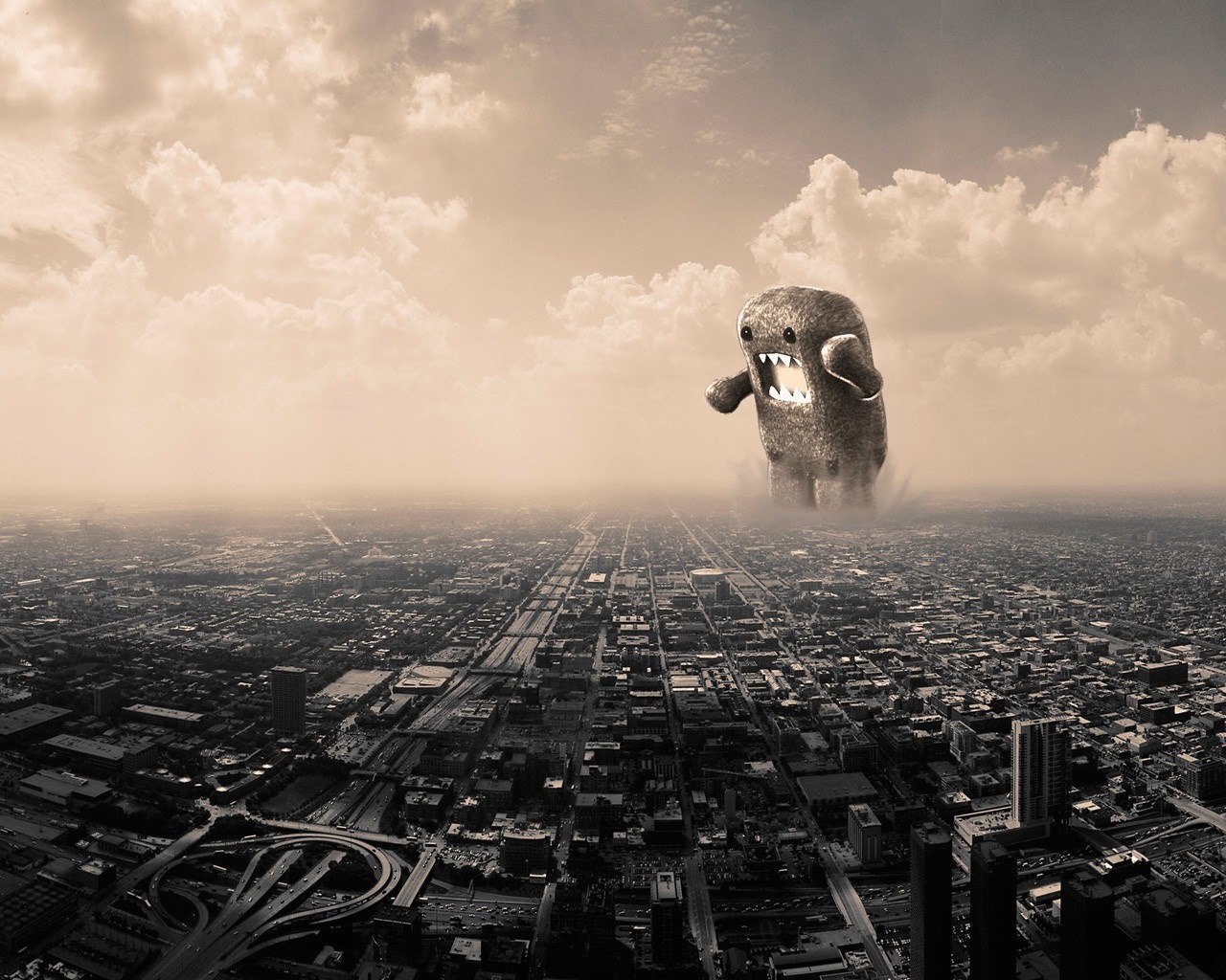 Domo-kun monster over a monochrome cityscape HD Wallpaper