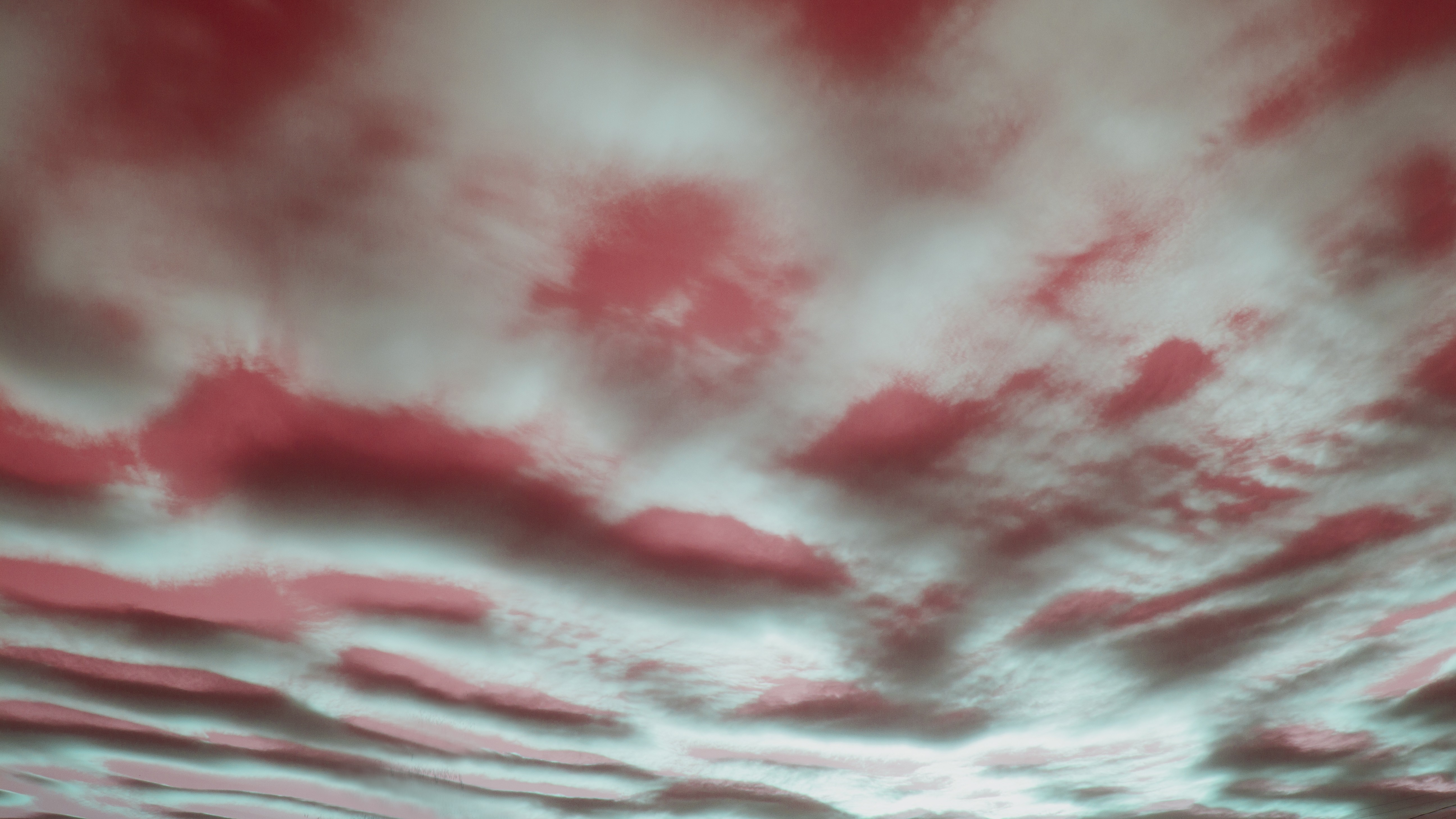 Red and teal clouds in the sky HD Wallpaper