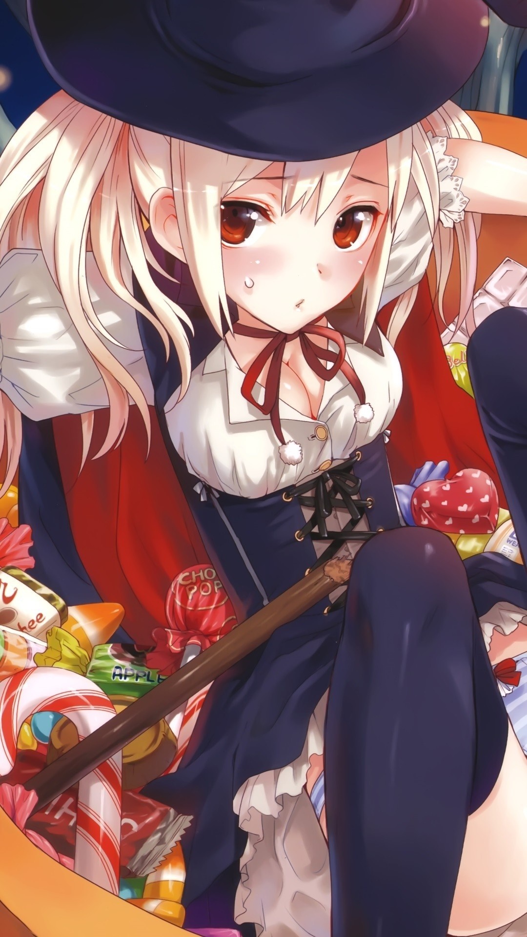 Anime girl in witch costume surrounded by candy HD Wallpaper