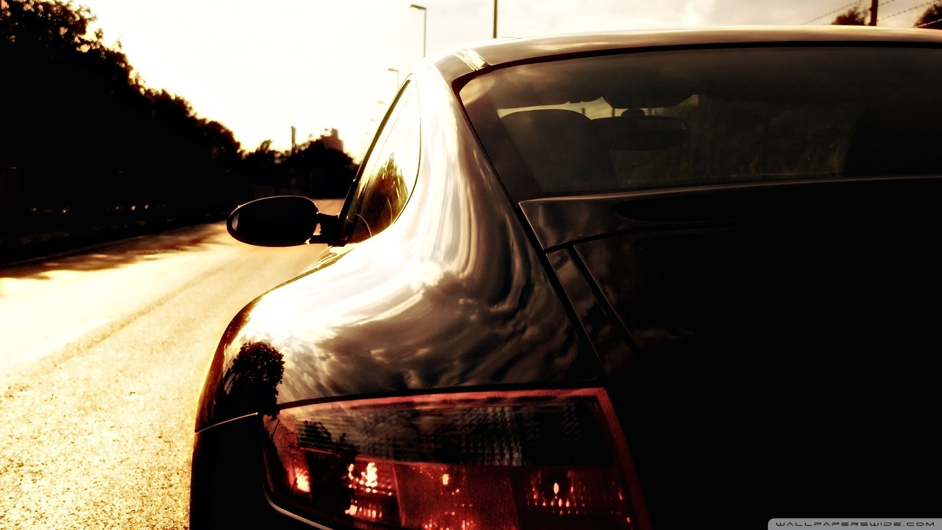 Black Porsche car on a road at dusk HD Wallpaper