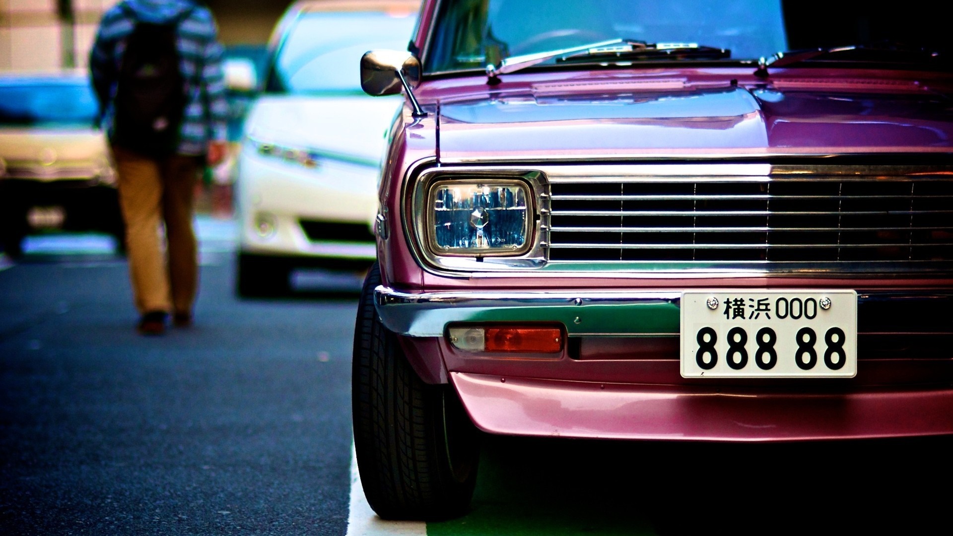 Close-up of a vintage Datsun car with Japanese license plate HD Wallpaper