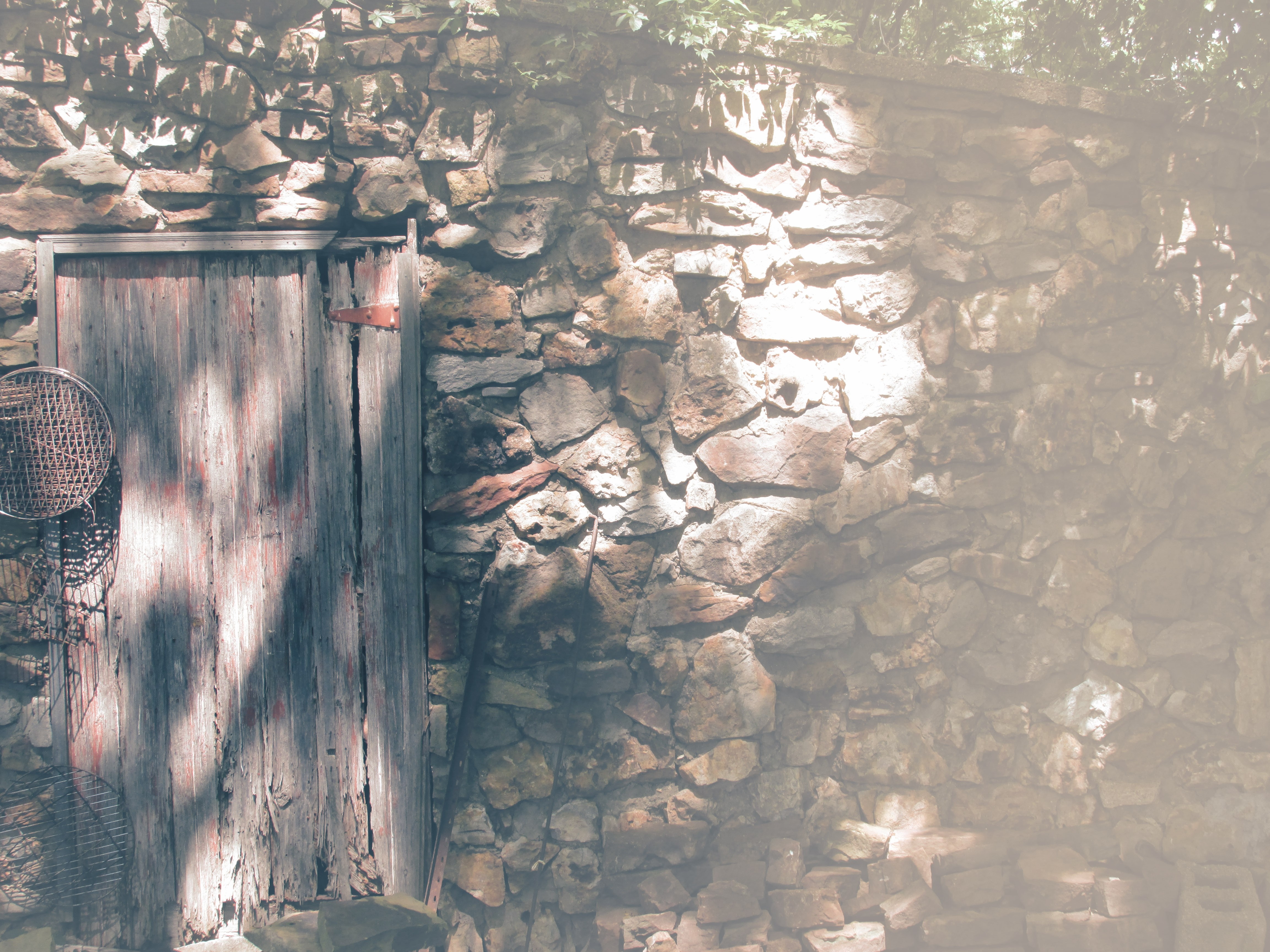 Old wooden door on a stone wall HD Wallpaper