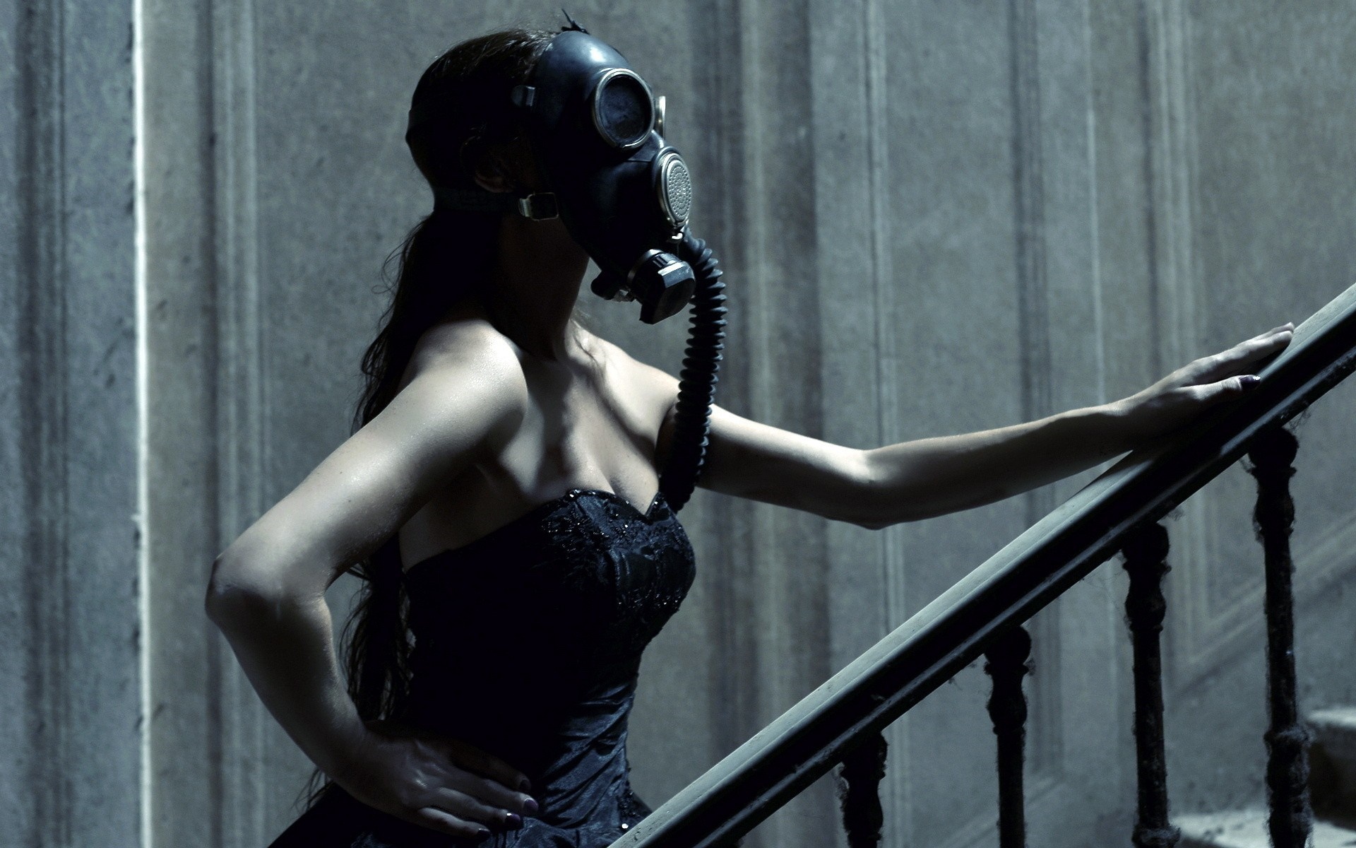 Woman in Black Dress Wearing Gas Mask on Staircase HD Wallpaper