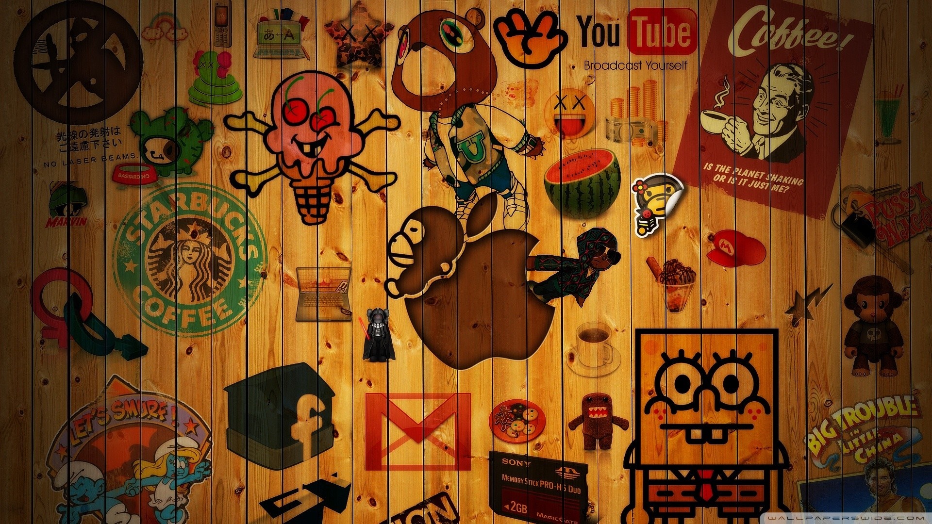 Collage of pop culture logos and characters on wood HD Wallpaper