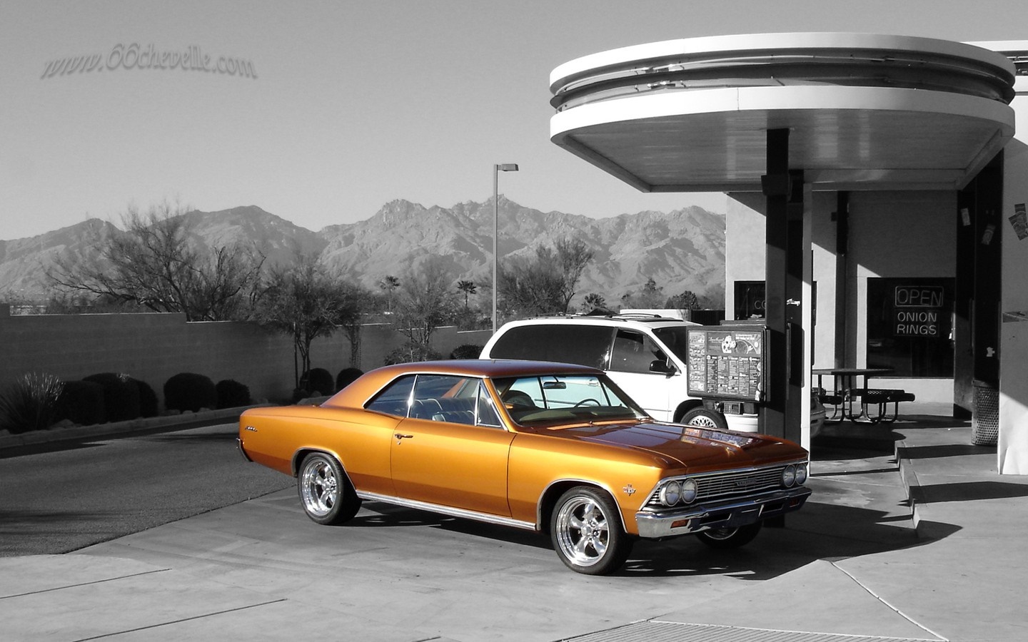Orange 1966 Chevrolet Chevelle parked at a drive-thru restaurant HD Wallpaper