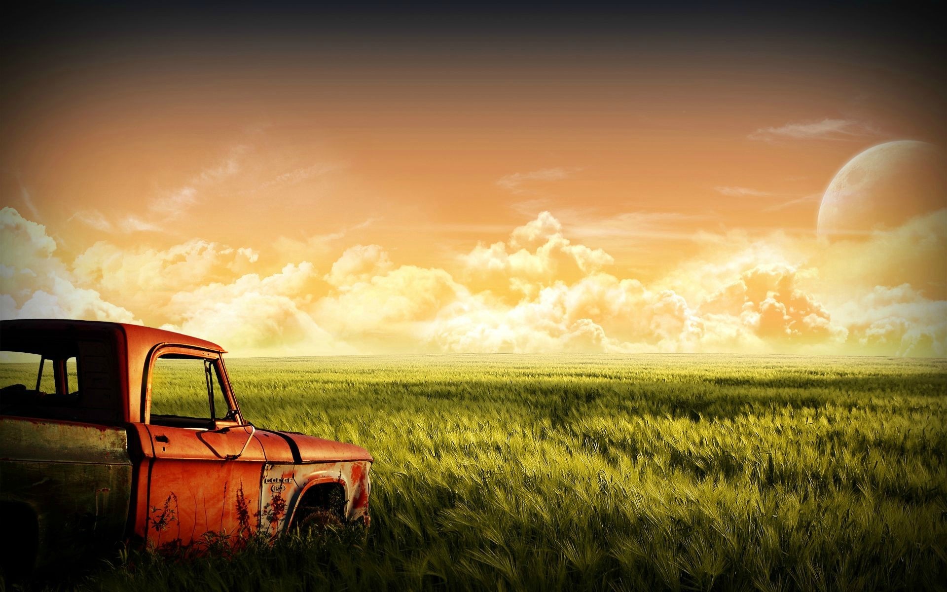 Old rusty truck in a field at sunset HD Wallpaper