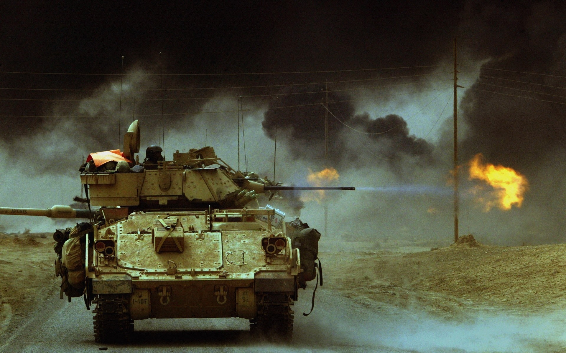 Bradley Fighting Vehicle firing weapon in combat HD Wallpaper