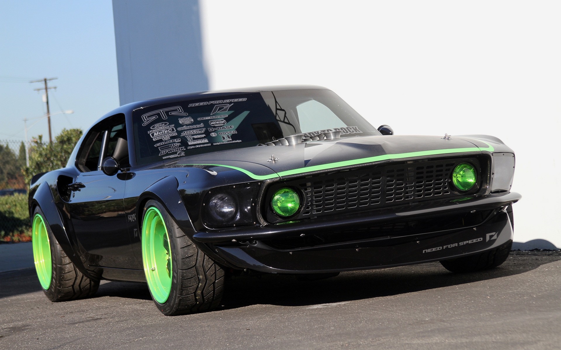 Customized black Ford Mustang with green accents HD Wallpaper