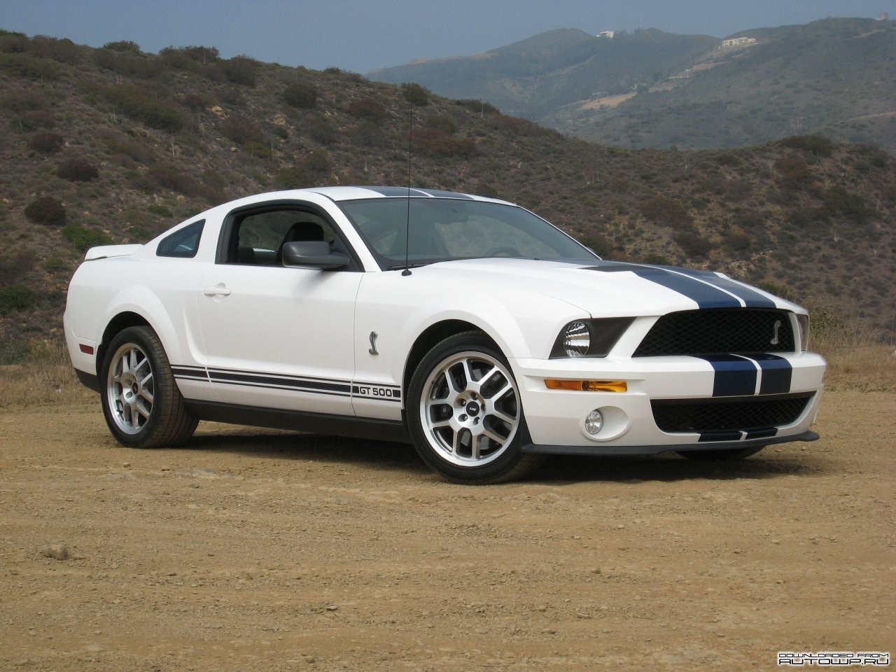 White Ford Shelby GT500 parked on a dirt road HD Wallpaper