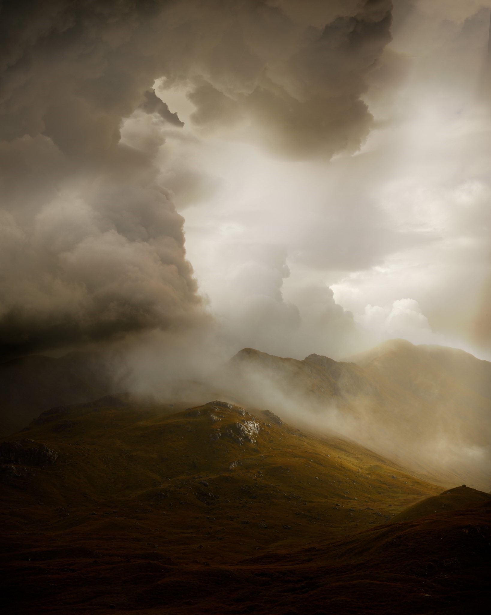 Misty mountains under stormy clouds in Iceland HD Phone Wallpaper