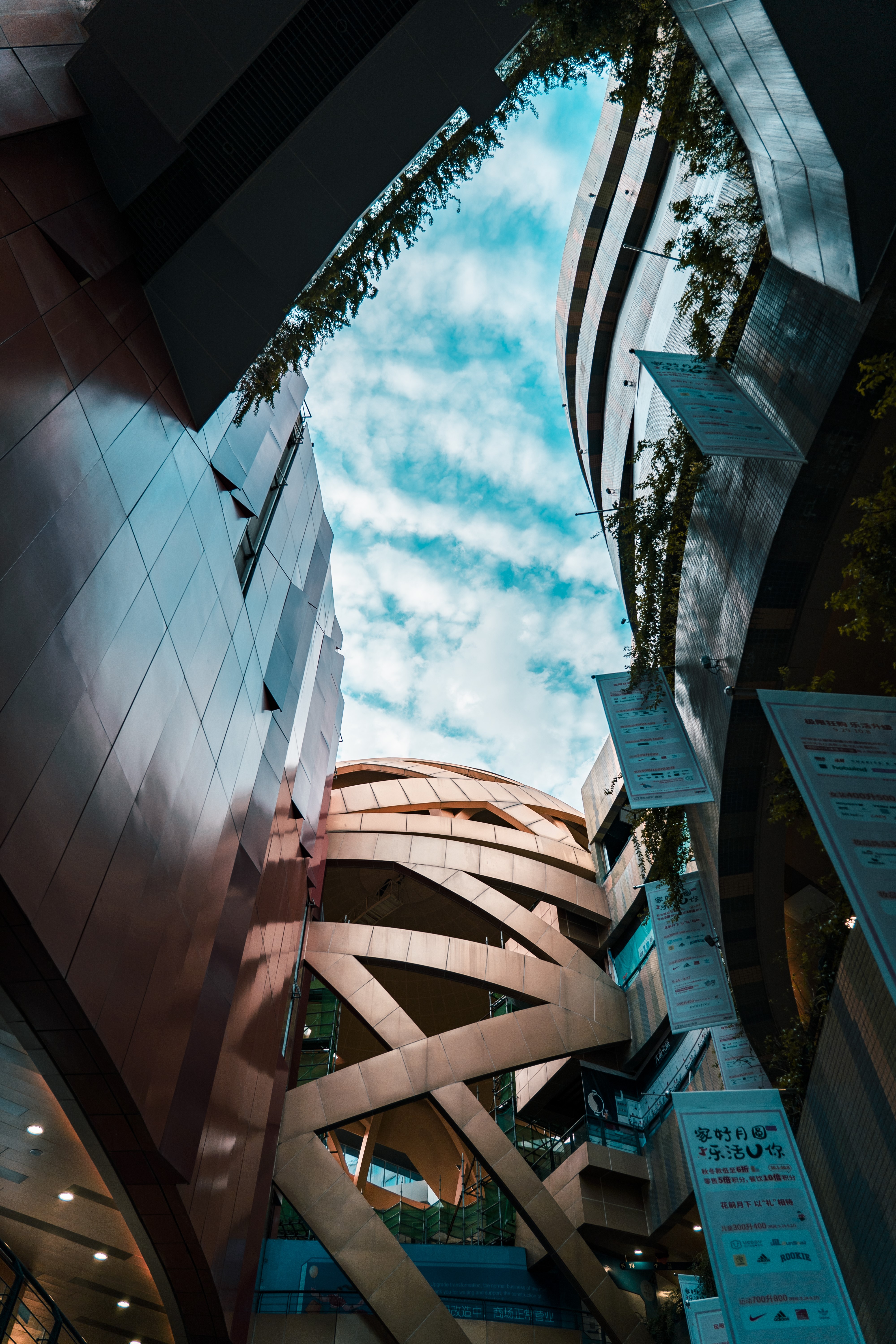 Worm's eye view of modern architecture in Nanjing, China HD Phone Wallpaper