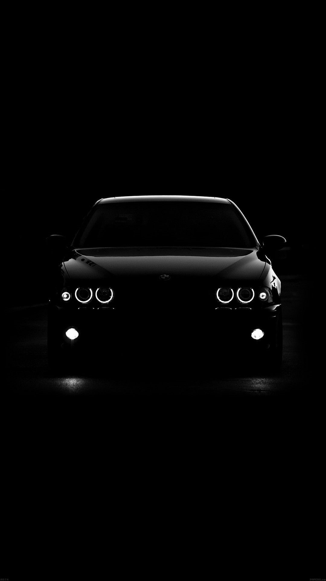 Dark BMW car with glowing headlights HD Phone Wallpaper