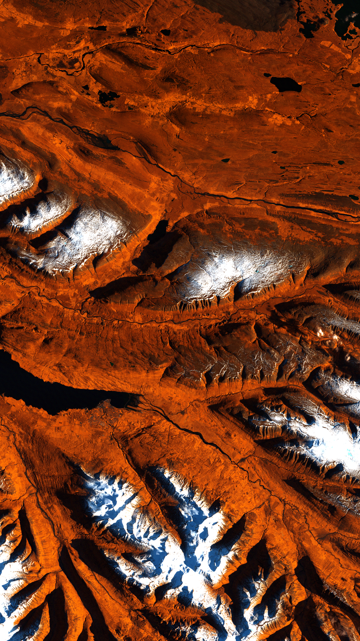 Satellite view of mountainous terrain with snow HD Phone Wallpaper