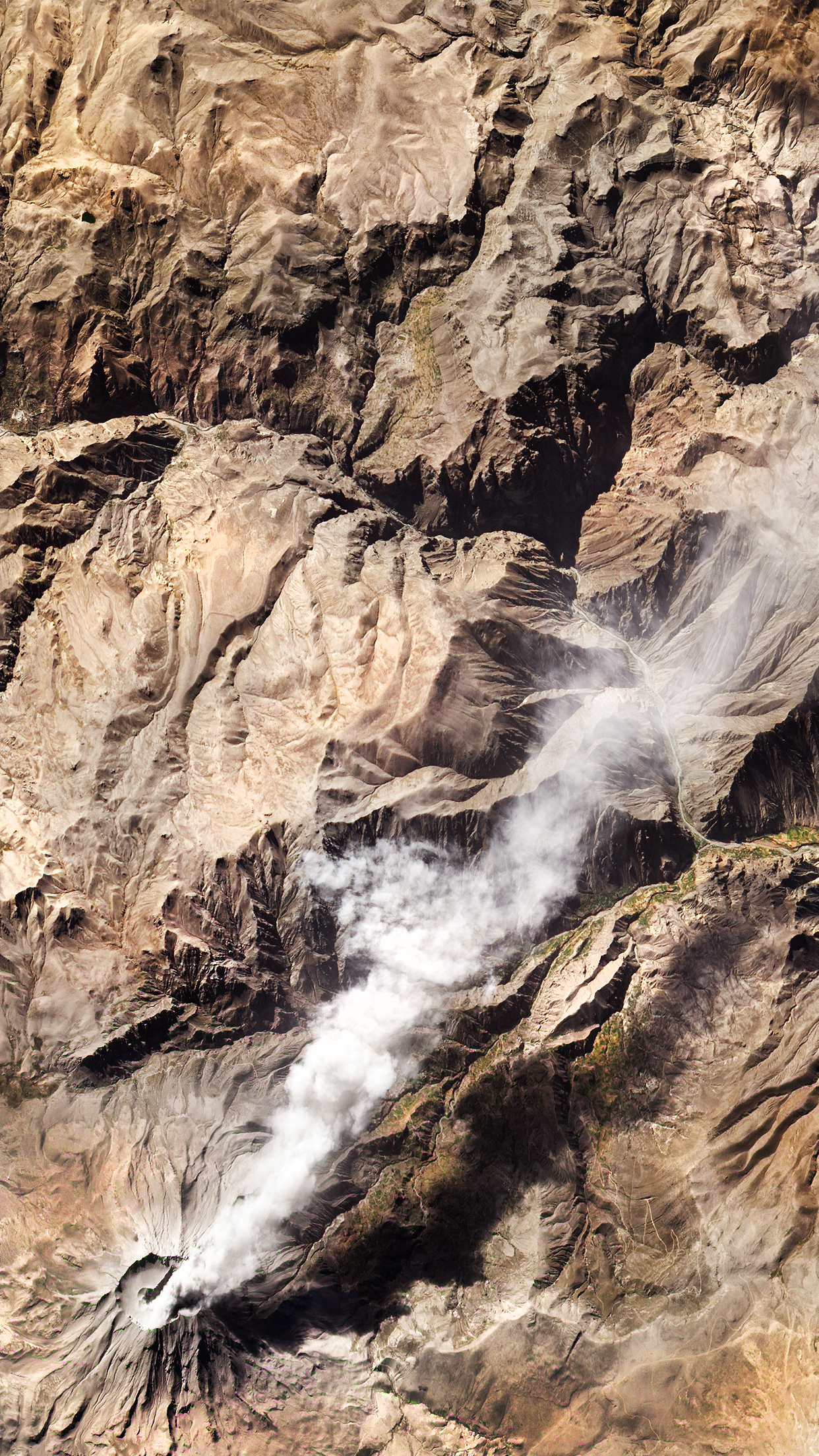 Satellite view of a smoking volcano HD Phone Wallpaper